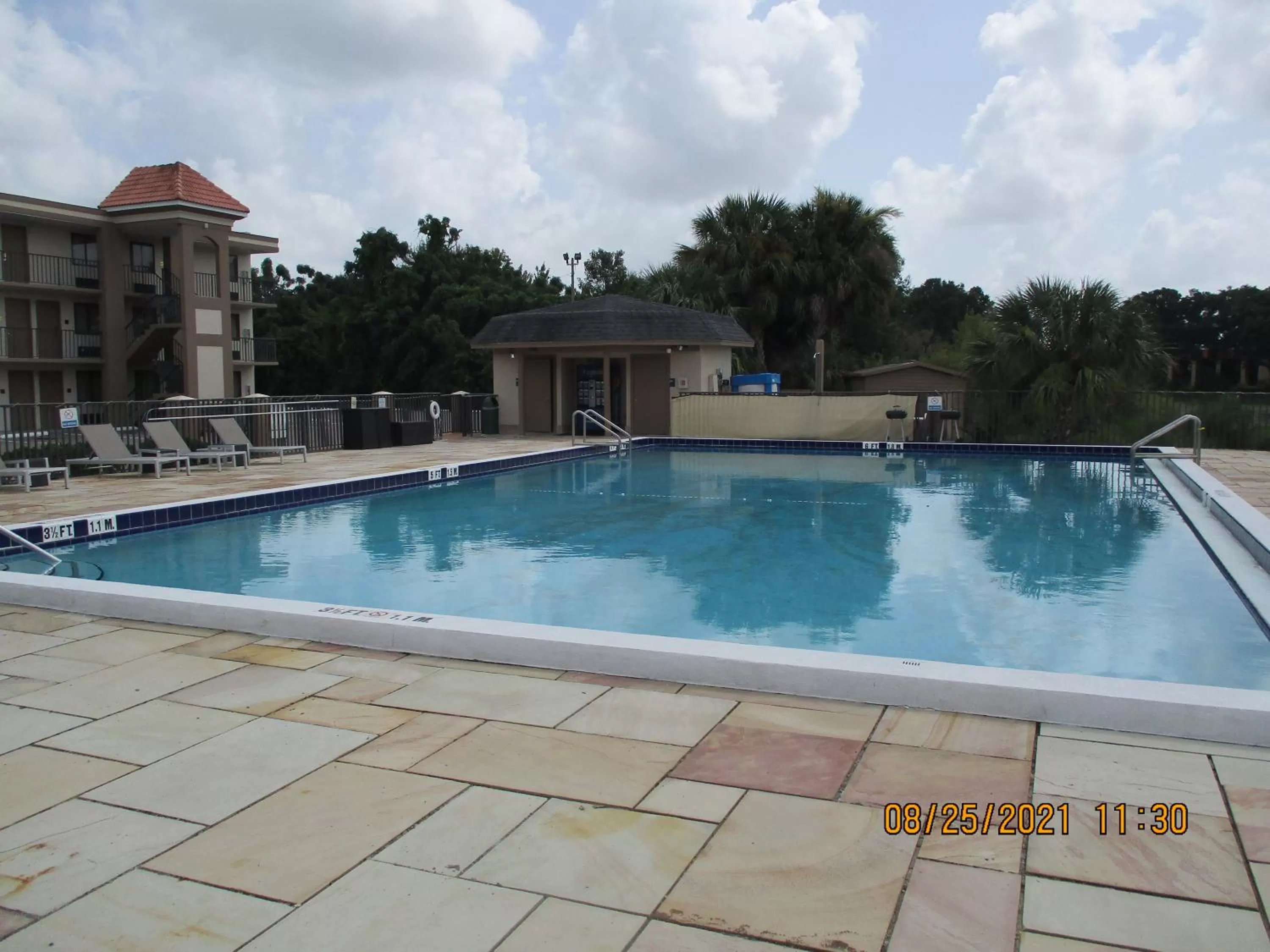 Swimming pool in Quality Inn & Suites Kissimmee by The Lake