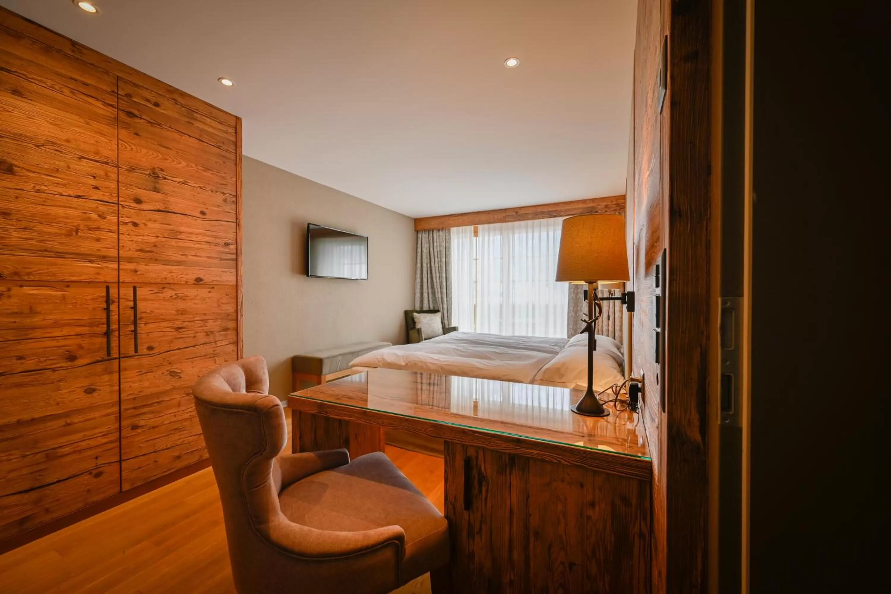 Bedroom in Romantik Hotel Schweizerhof