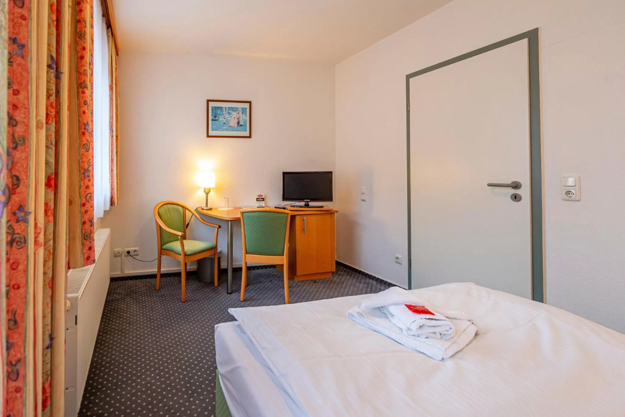 Photo of the whole room, Bed in Hotel Rostock West im "Kritzmow Park"