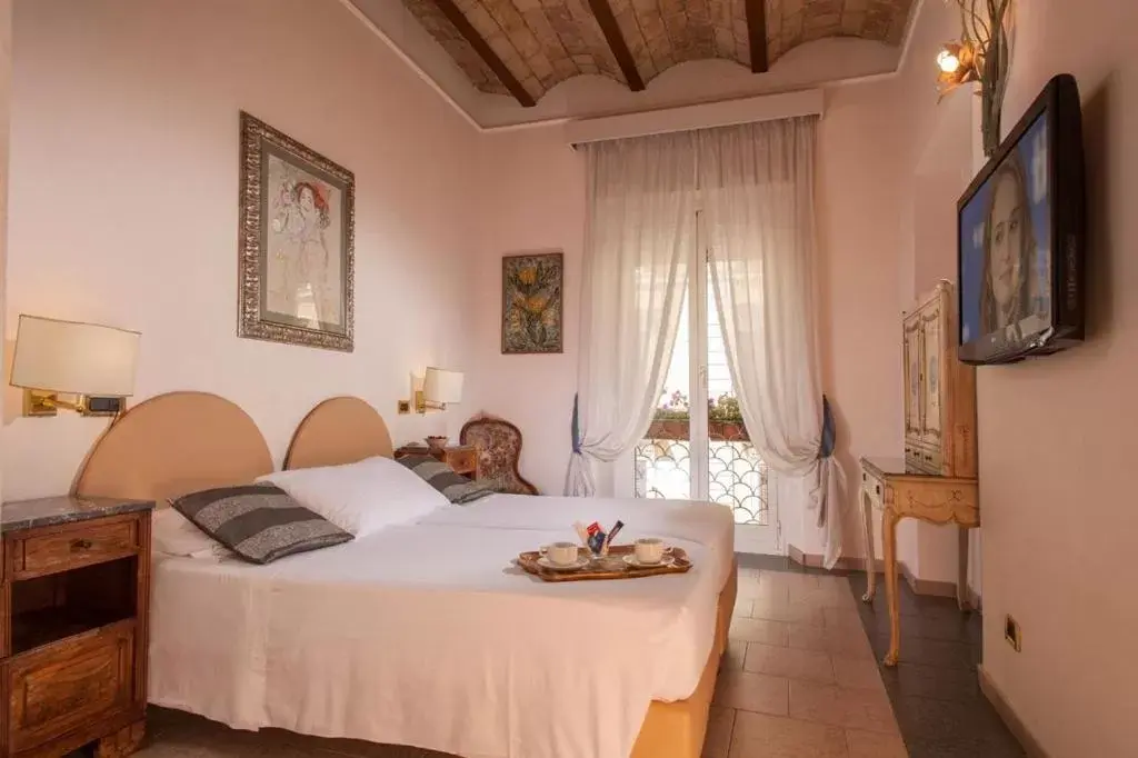 Deluxe Family Room in Hotel Sant'Angelo Deluxe Family Room in Hotel Sant'Angelo