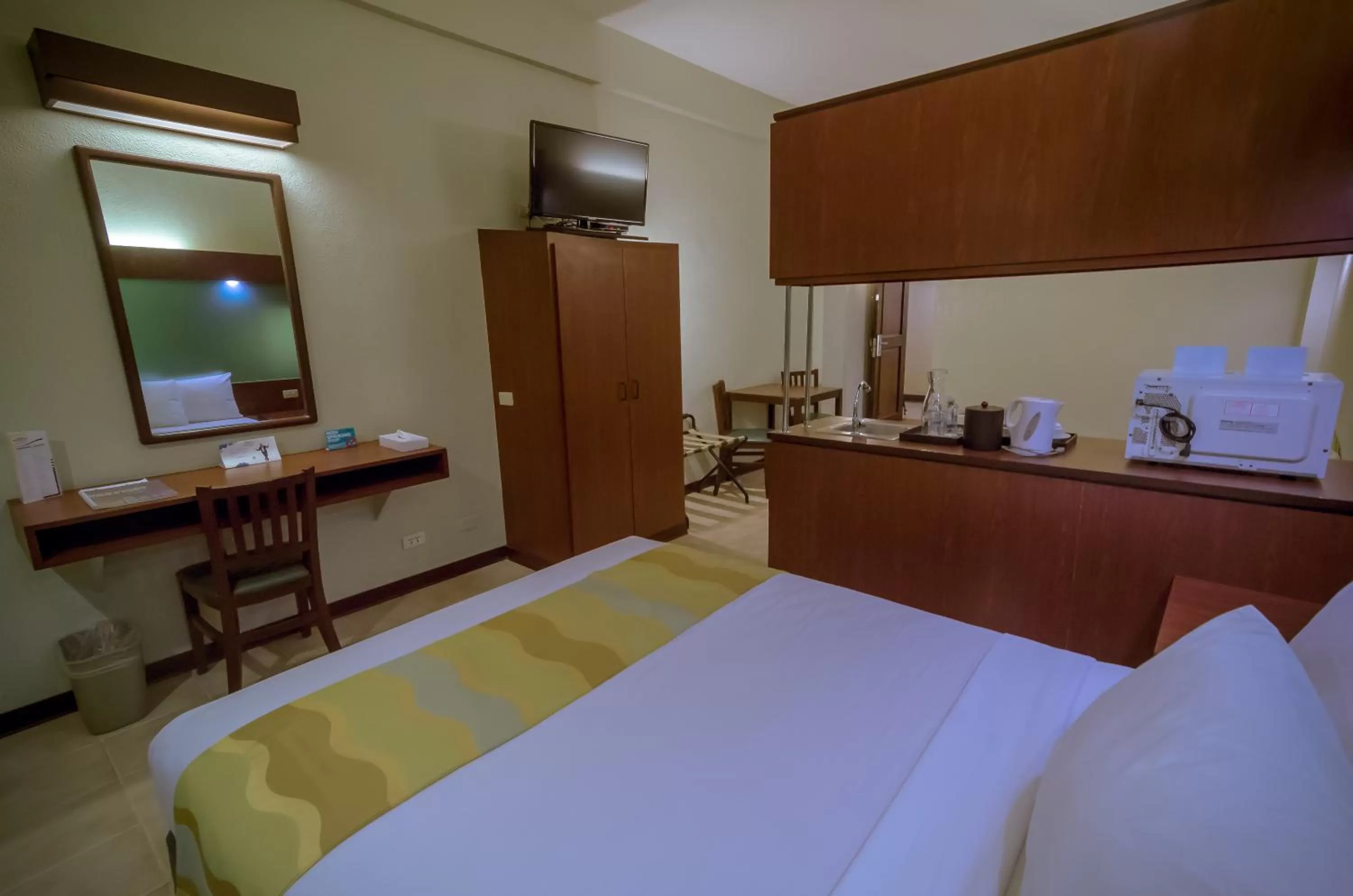 Photo of the whole room, Bed in Microtel by Wyndham Tarlac