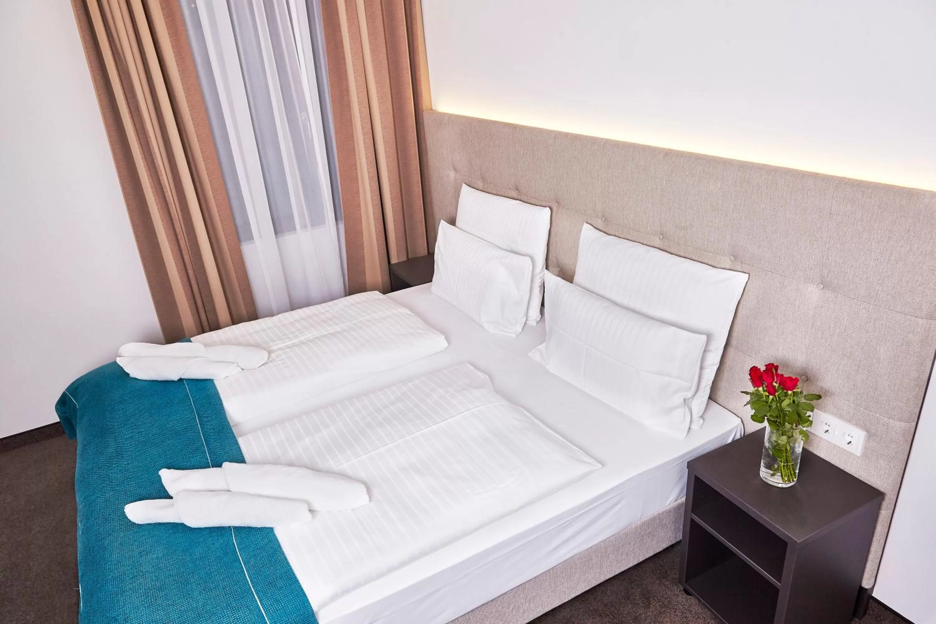 Bed in The Monument Hotel - BW Signature Collection