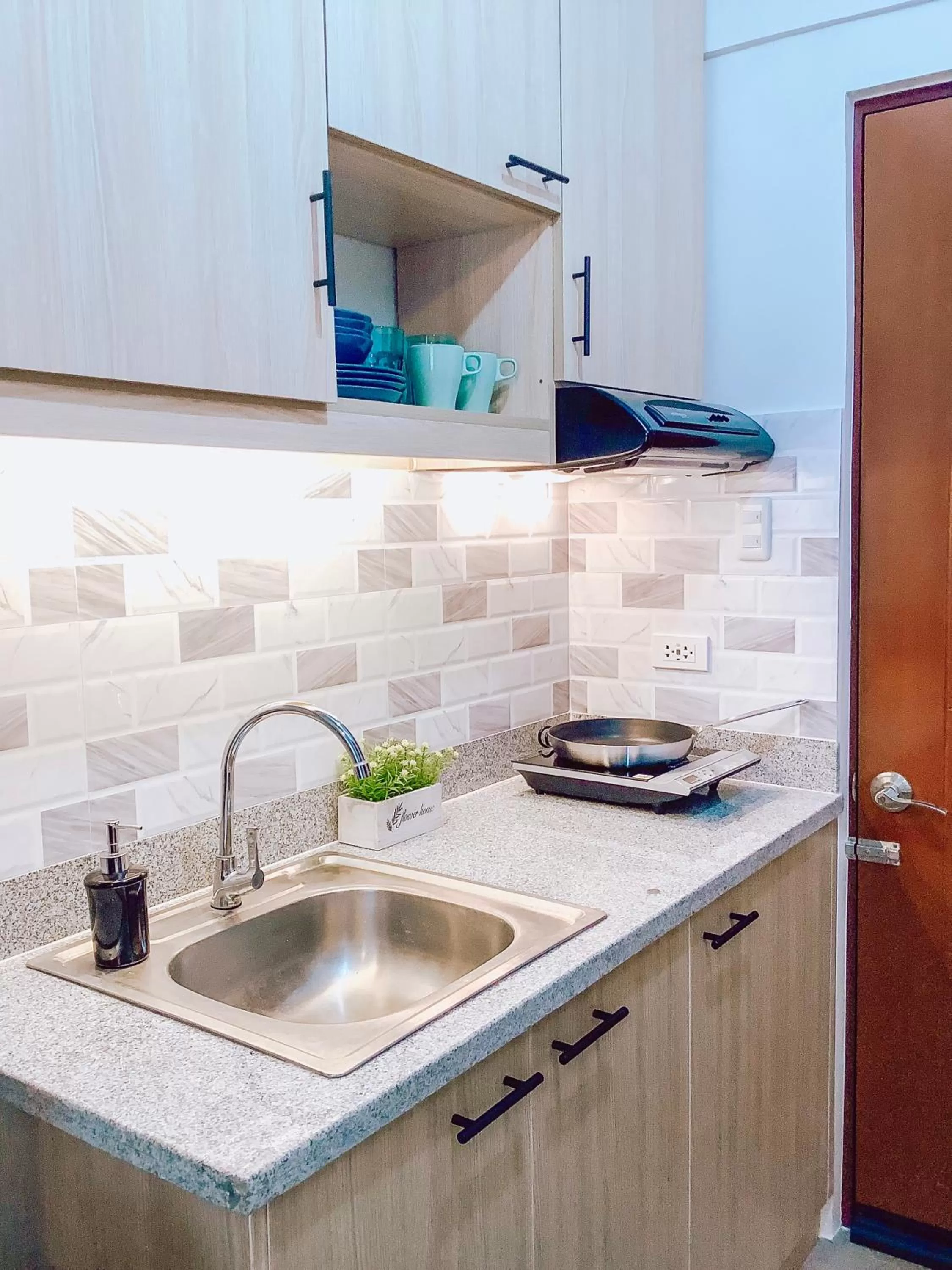 Kitchen or kitchenette in AZRA Bacolod at Mesavirre Garden Residences
