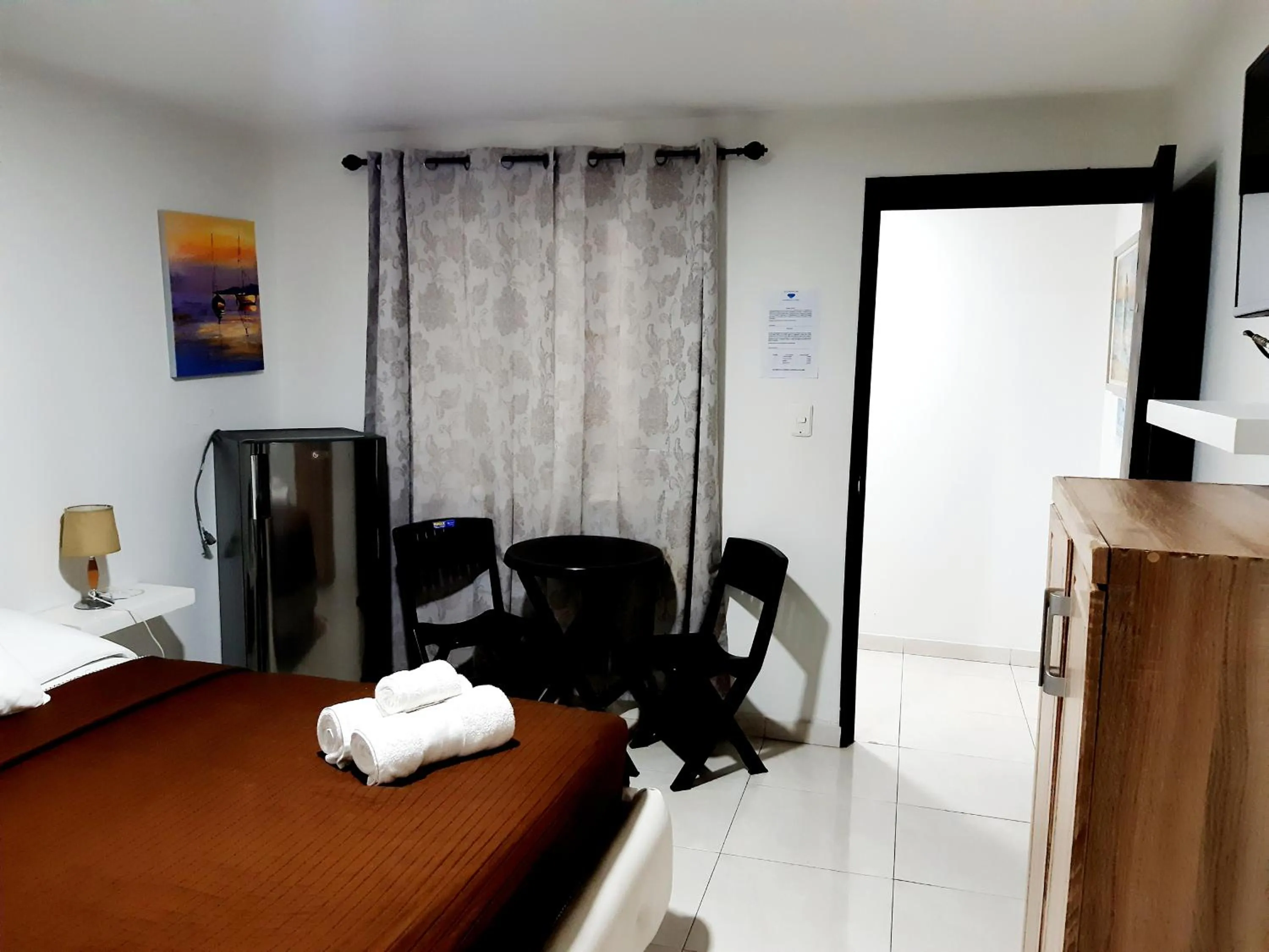 Photo of the whole room, Bed in Blue Emerald Inn