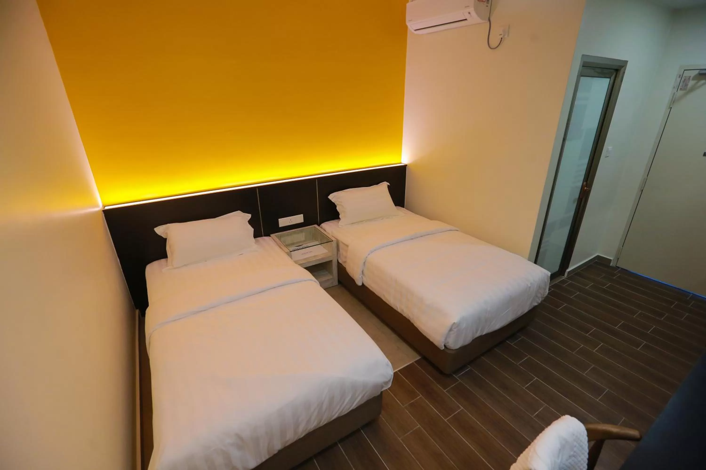 Bed in Pantai Regal Boutique Hotel