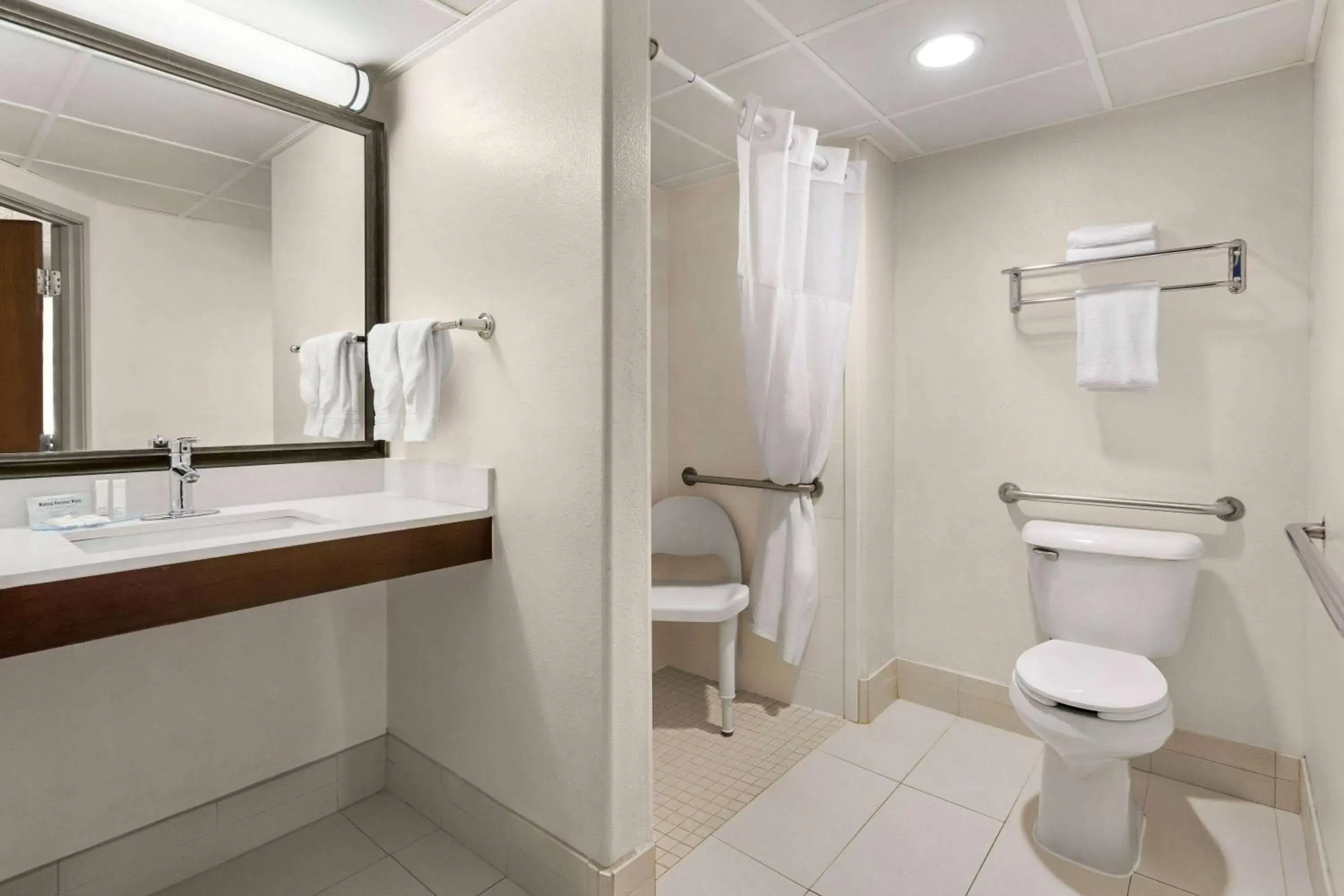 King Suite with Roll-In Shower - Accessible/ Non-Smoking in AmericInn by Wyndham Rapid City King Suite with Roll-In Shower - Accessible/ Non-Smoking in AmericInn by Wyndham Rapid City