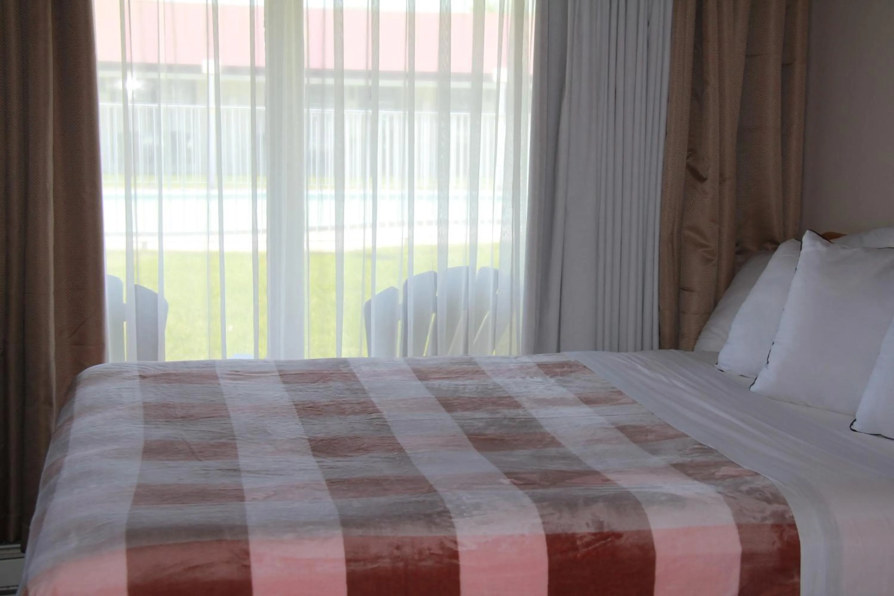 Bed in Hotel Motel Bonsoir