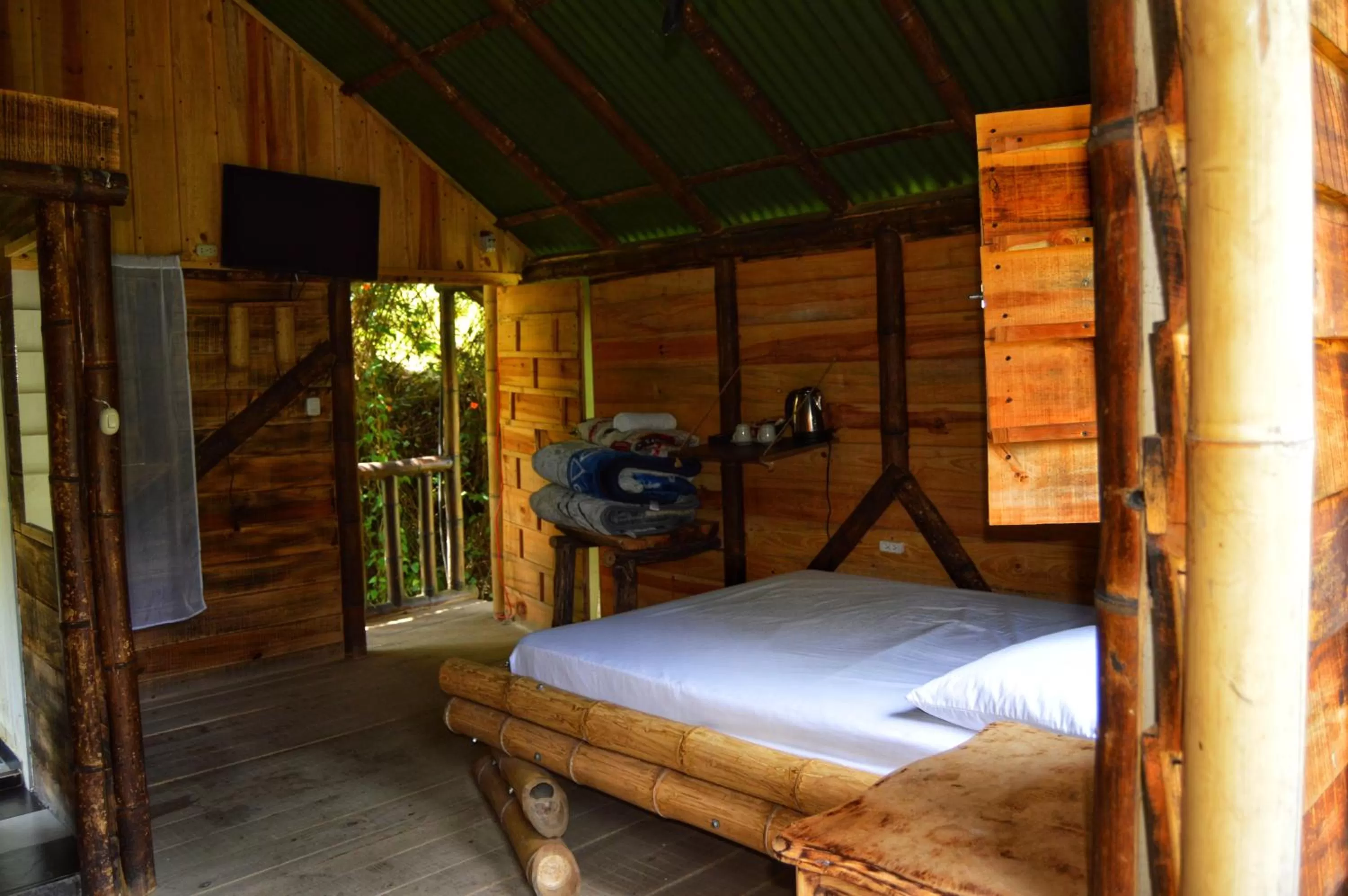 Bedroom in Cabañas Rústicas El Viejo Tambo By Rotamundos