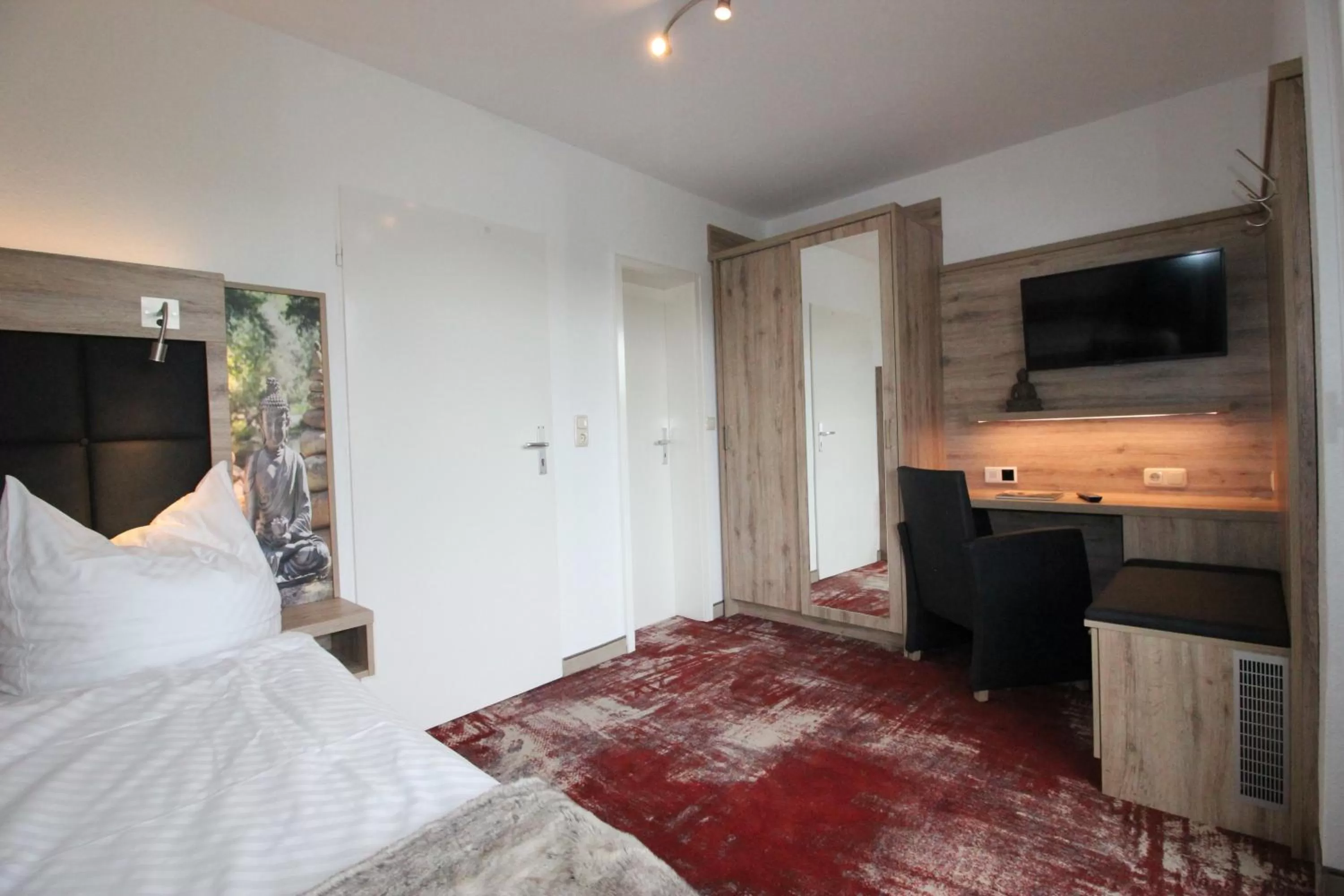 TV/Entertainment Center in Wellness & Ayurveda Hotel Am Eichenberg