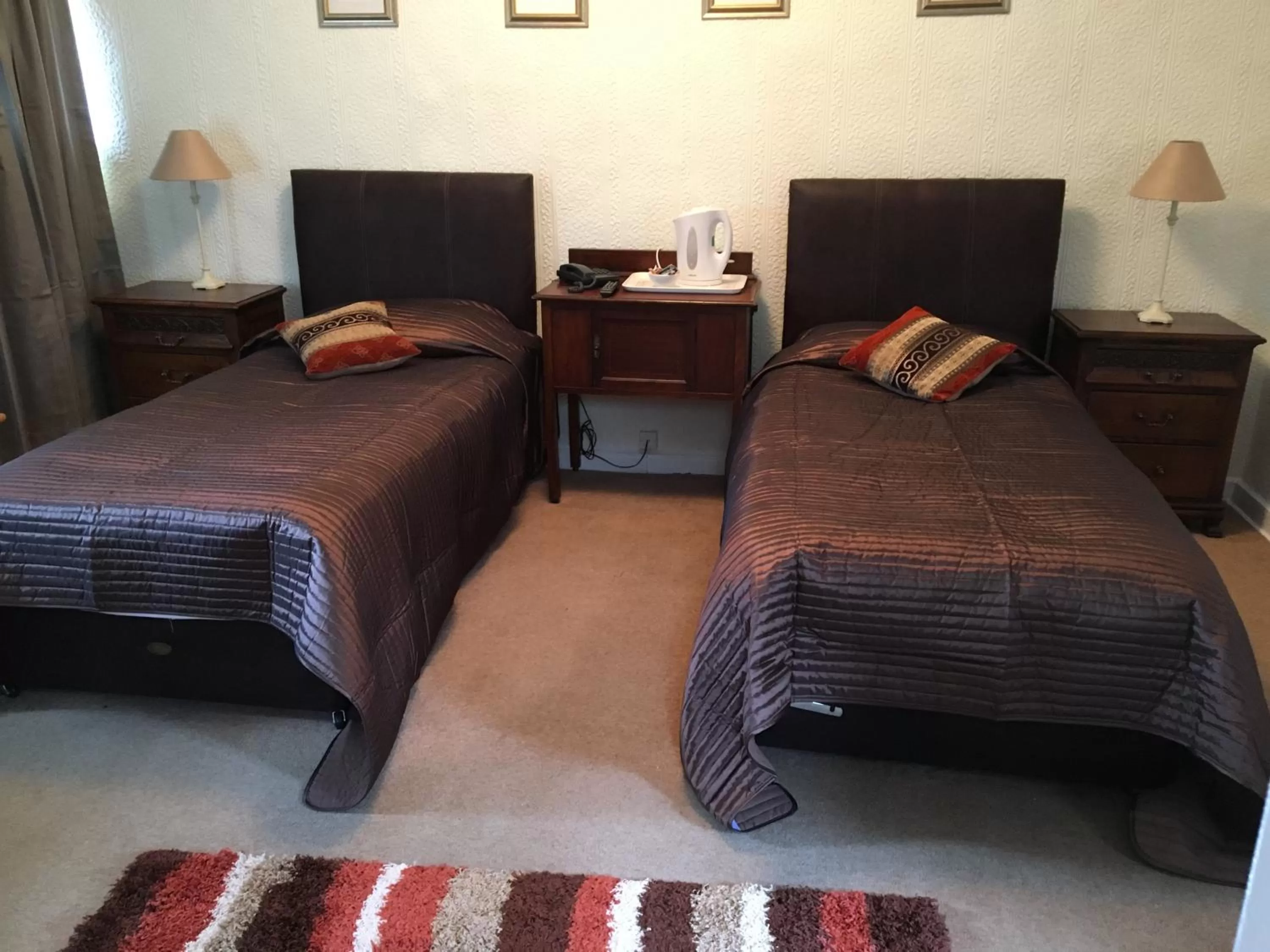 Bed in The Old Well Inn