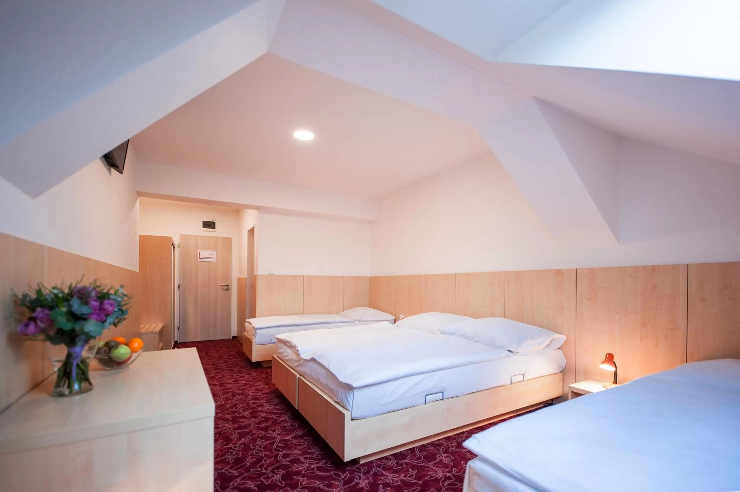 Bed in Hotel Pivovar