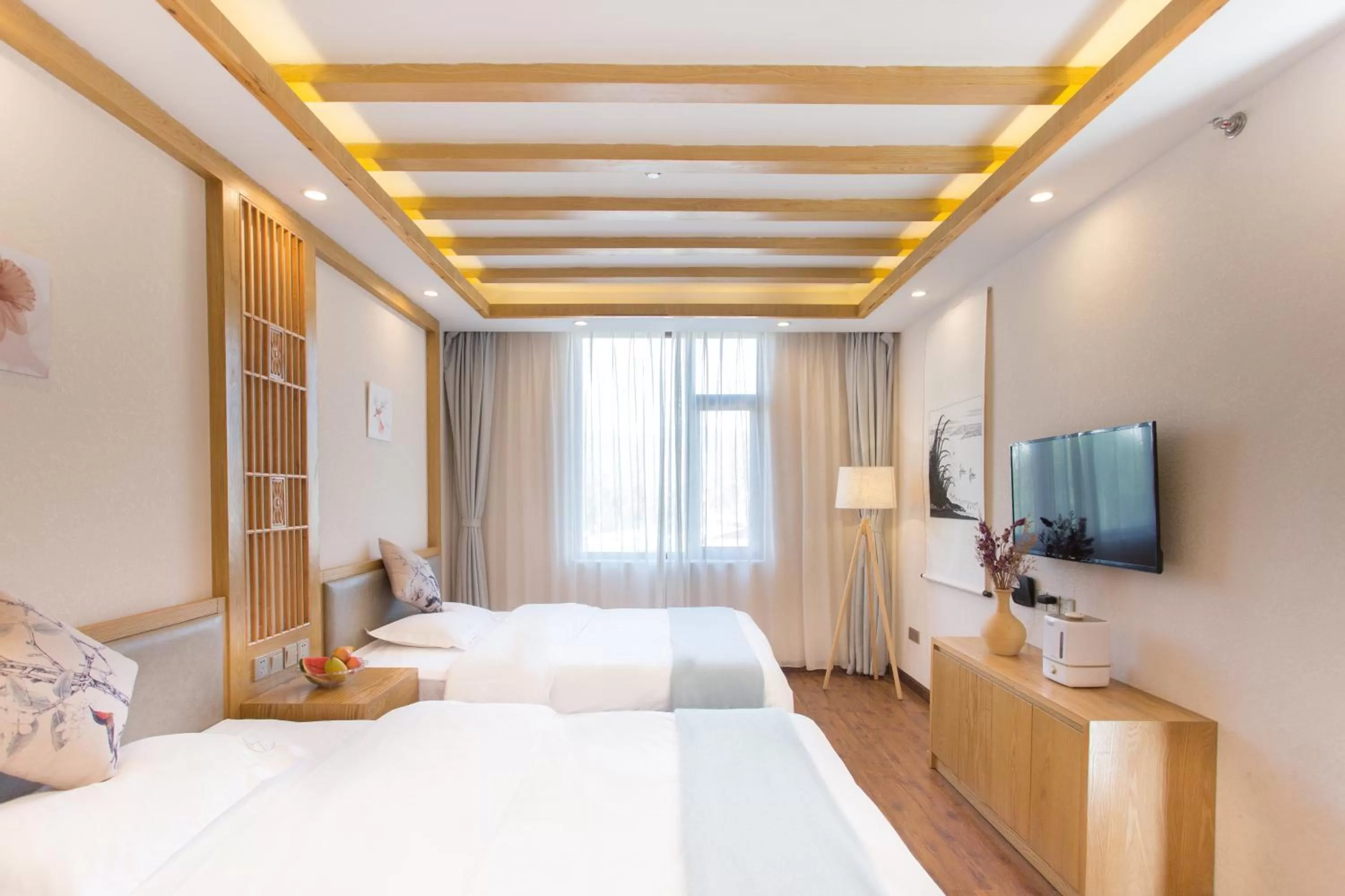 Bed in Lijiang Gemmer Hotel