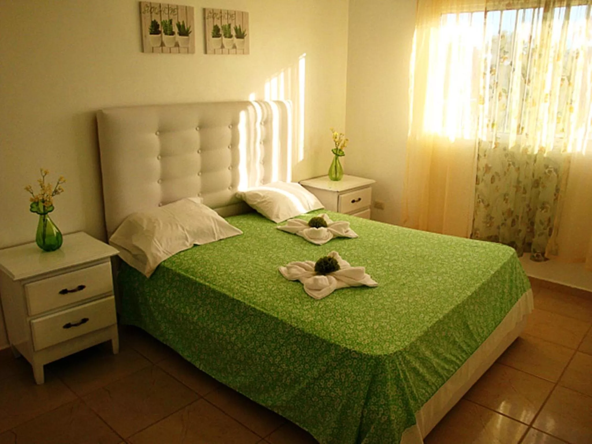 Bed in El Malecon B&B Hotel