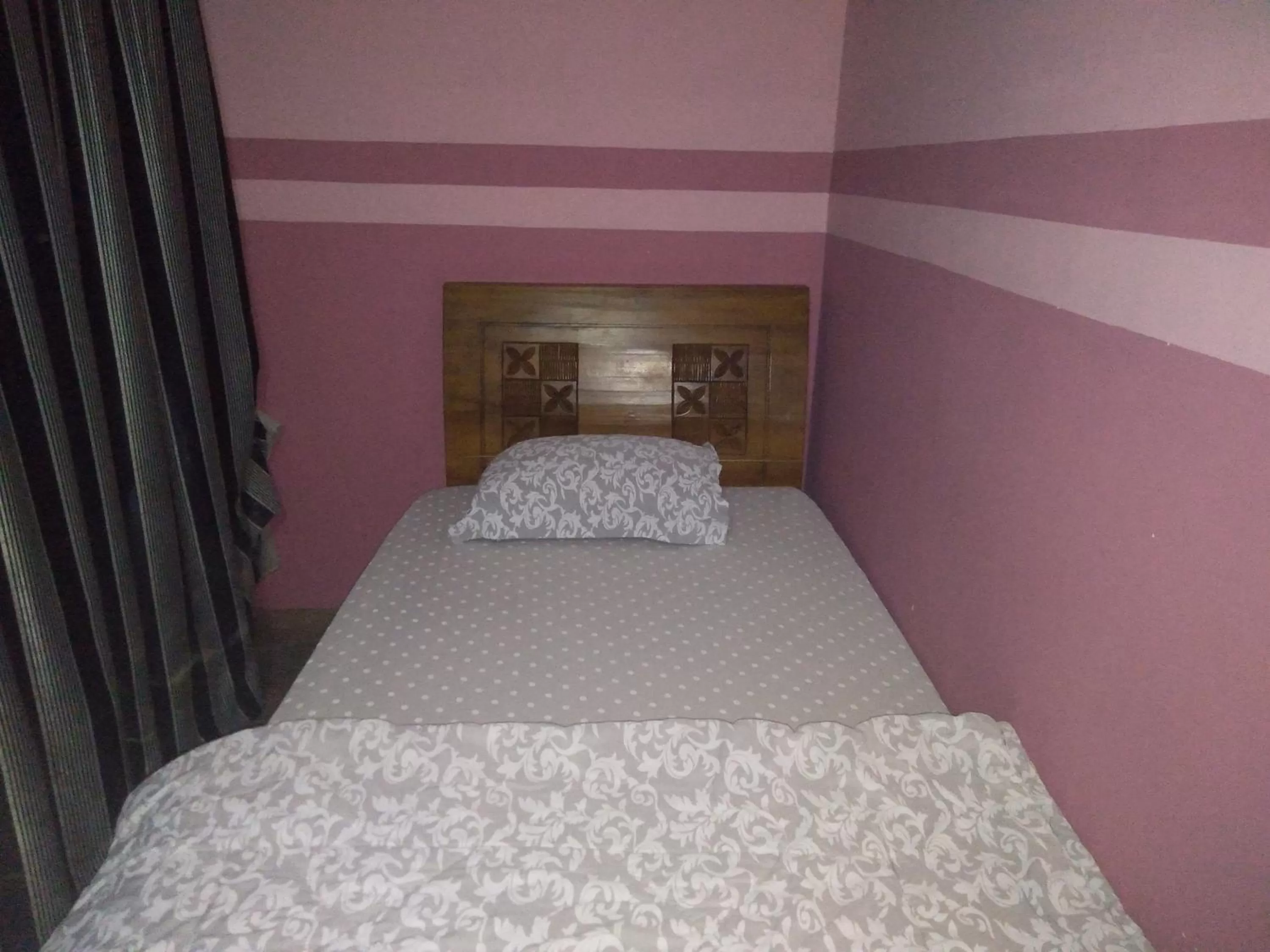 Bed in OYO 90346 Safa Hotel Ranau