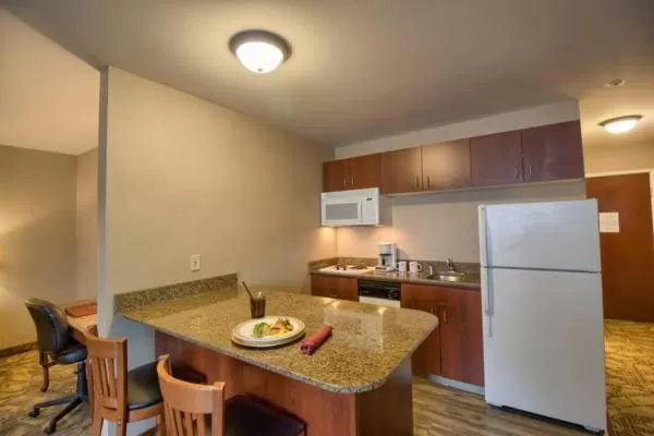Kitchen or kitchenette in Medallion Inn and Suites