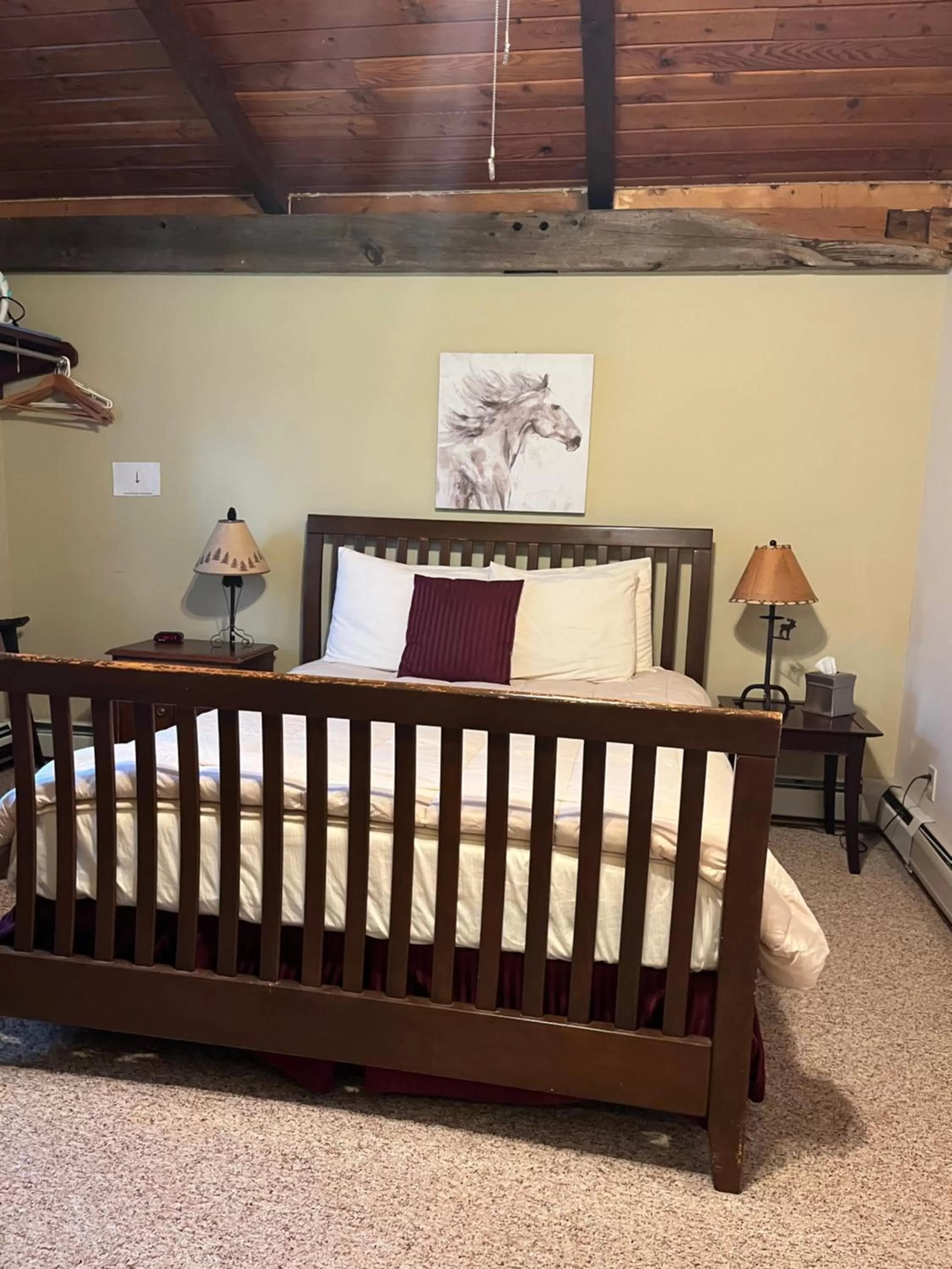 Bed in Vinehurst Inn & Suites