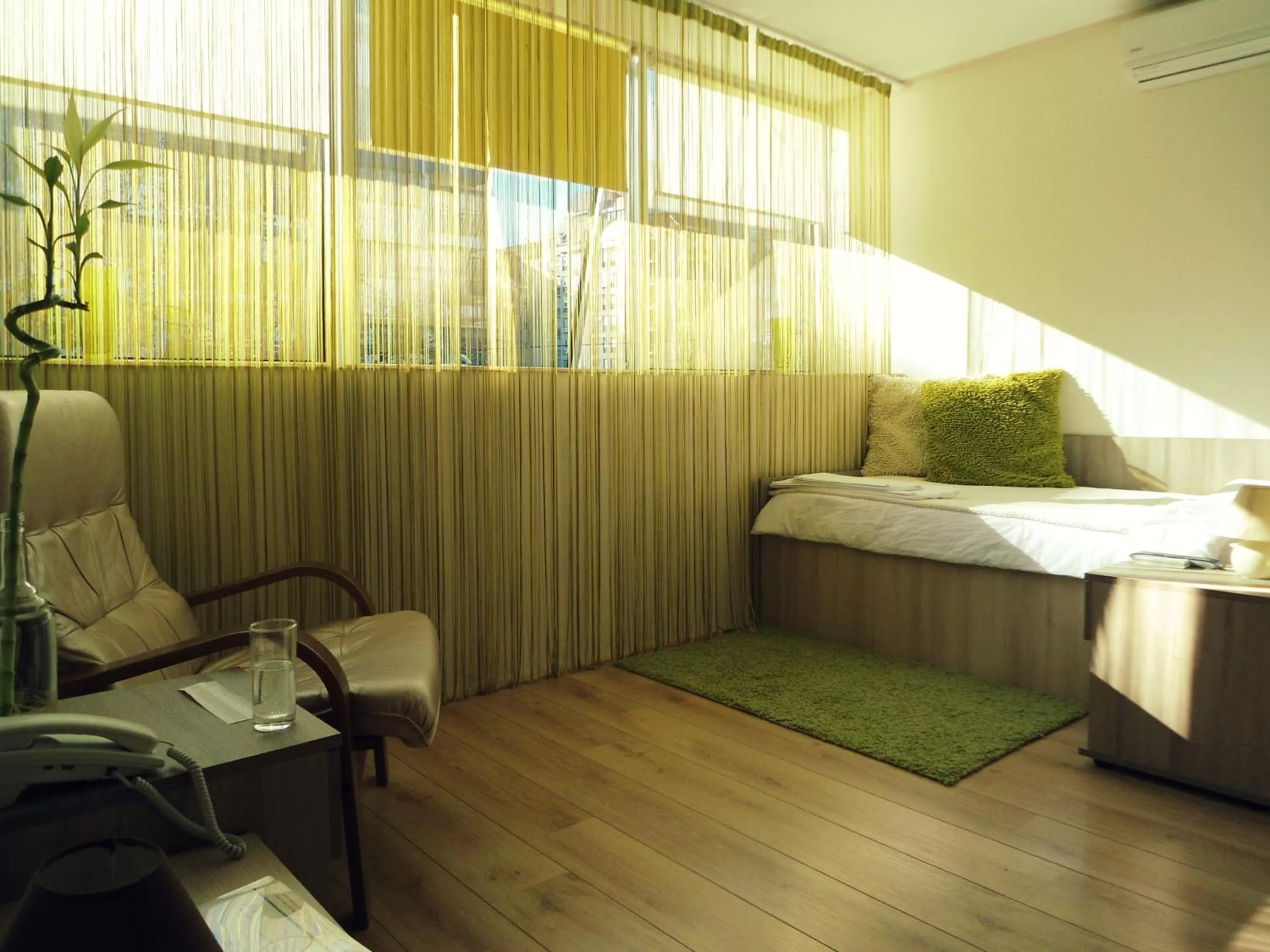 Bed, Seating Area in Garni Hotel Tri O