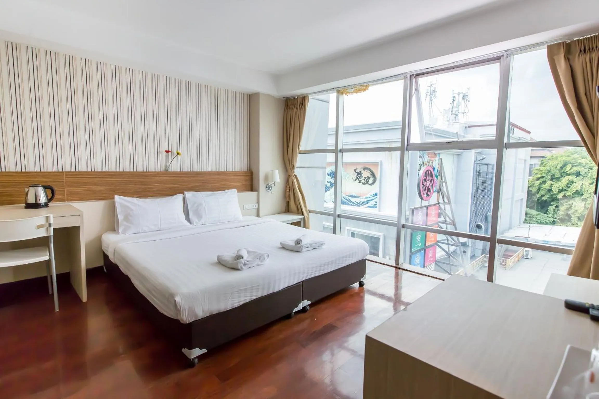 Bed in Snooze Hotel Thonglor Bangkok