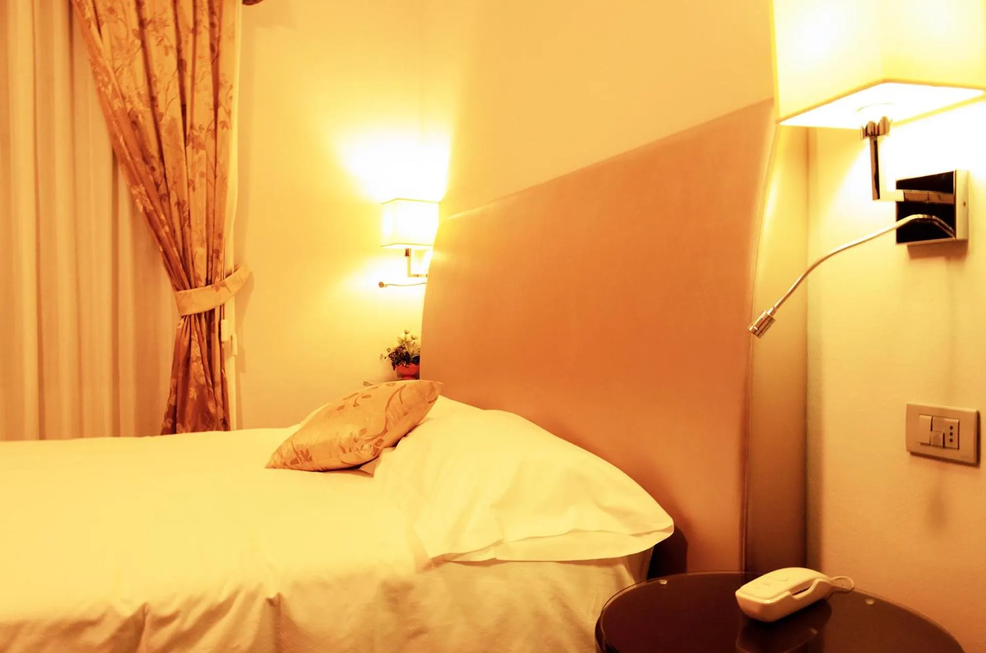 Bedroom in Sangallo Hotel