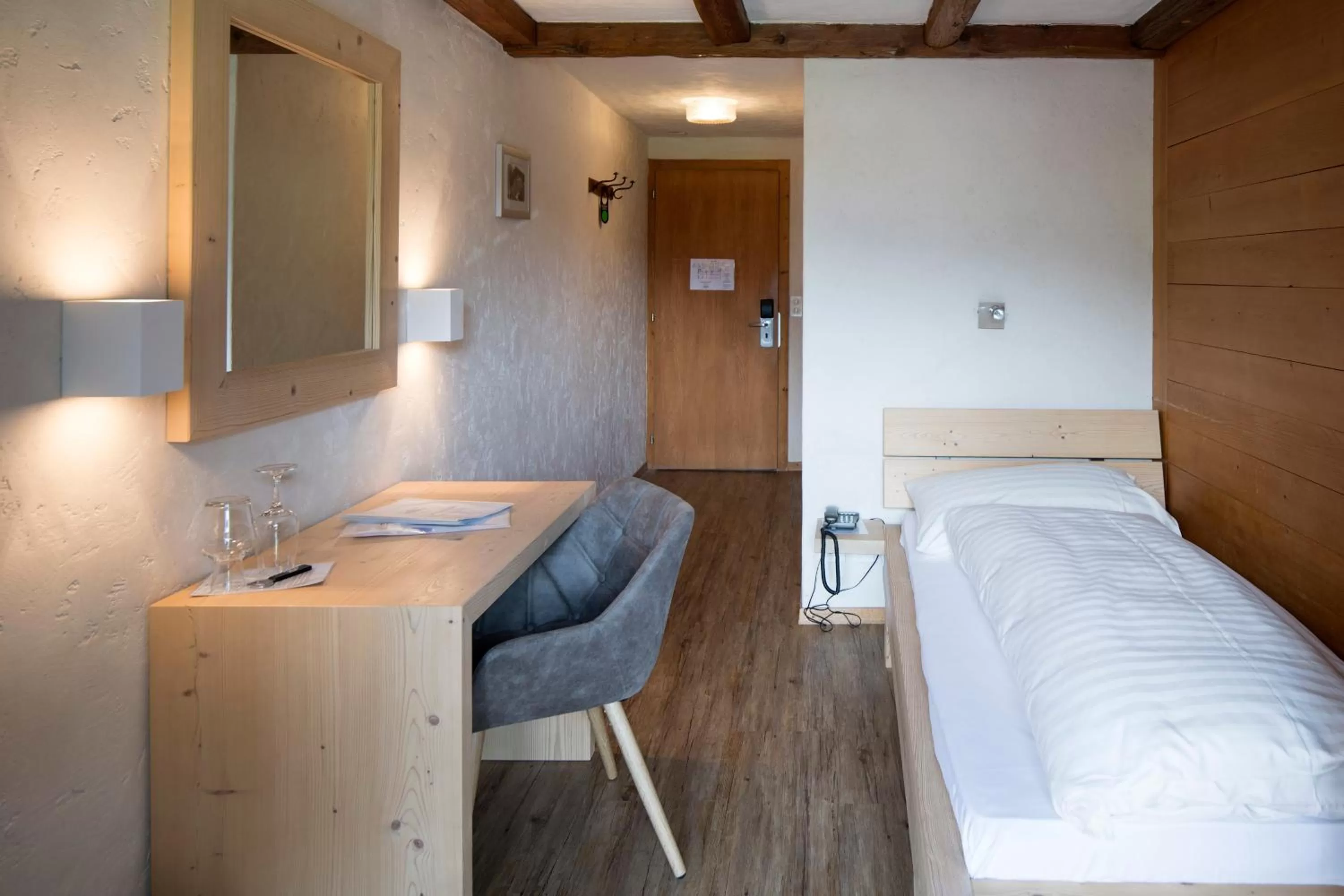 Bed in Hotel Alphorn