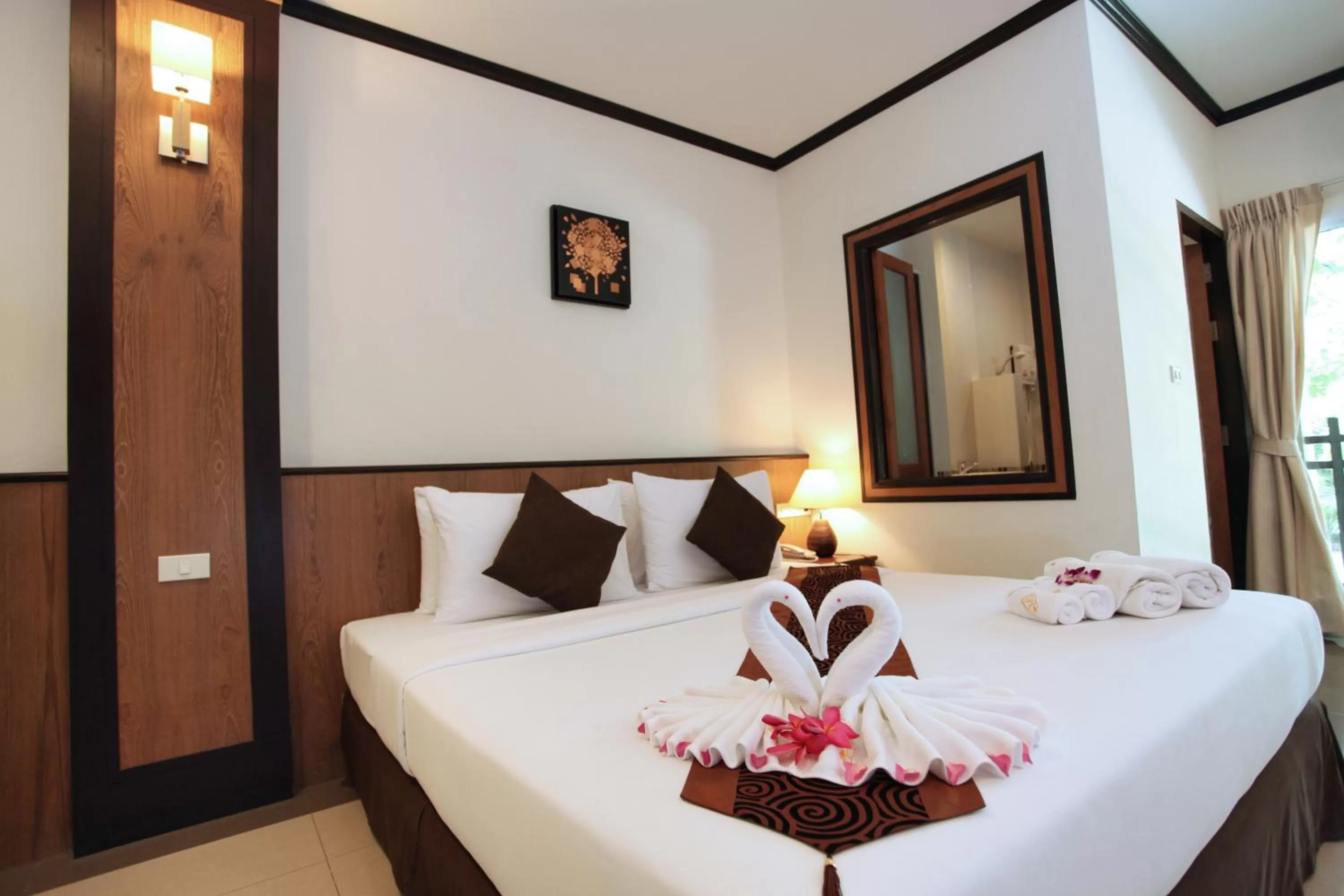 Decorative detail, Bed in Rapeepan Ville Hotel