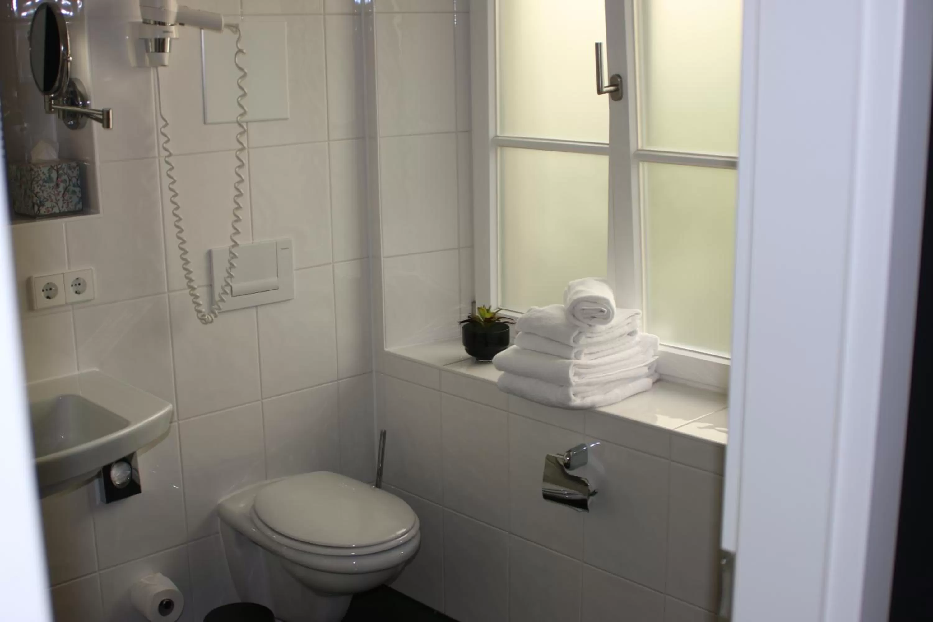 Bathroom in WDREI Hotel