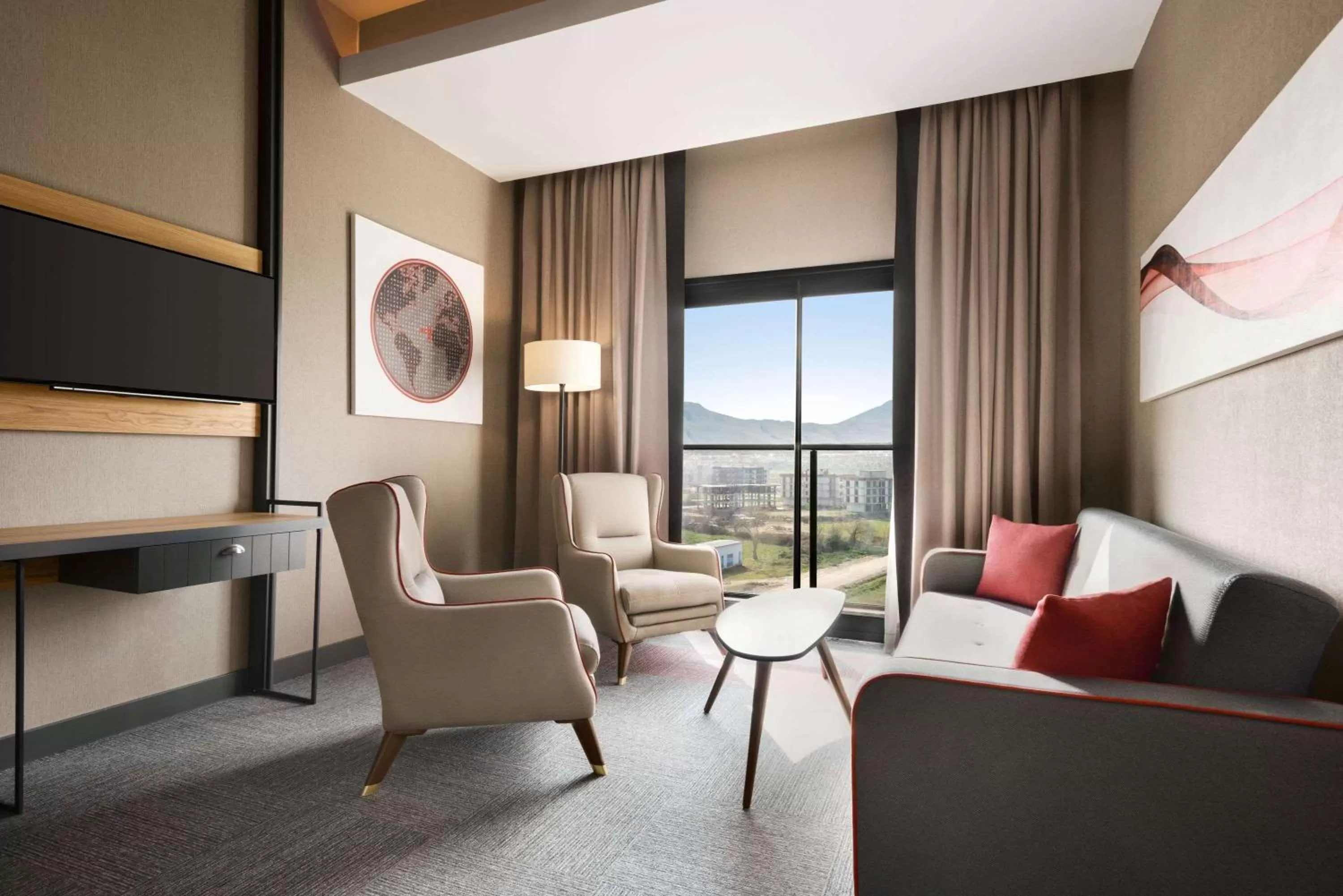 Photo of the whole room in Ramada By Wyndham Tire