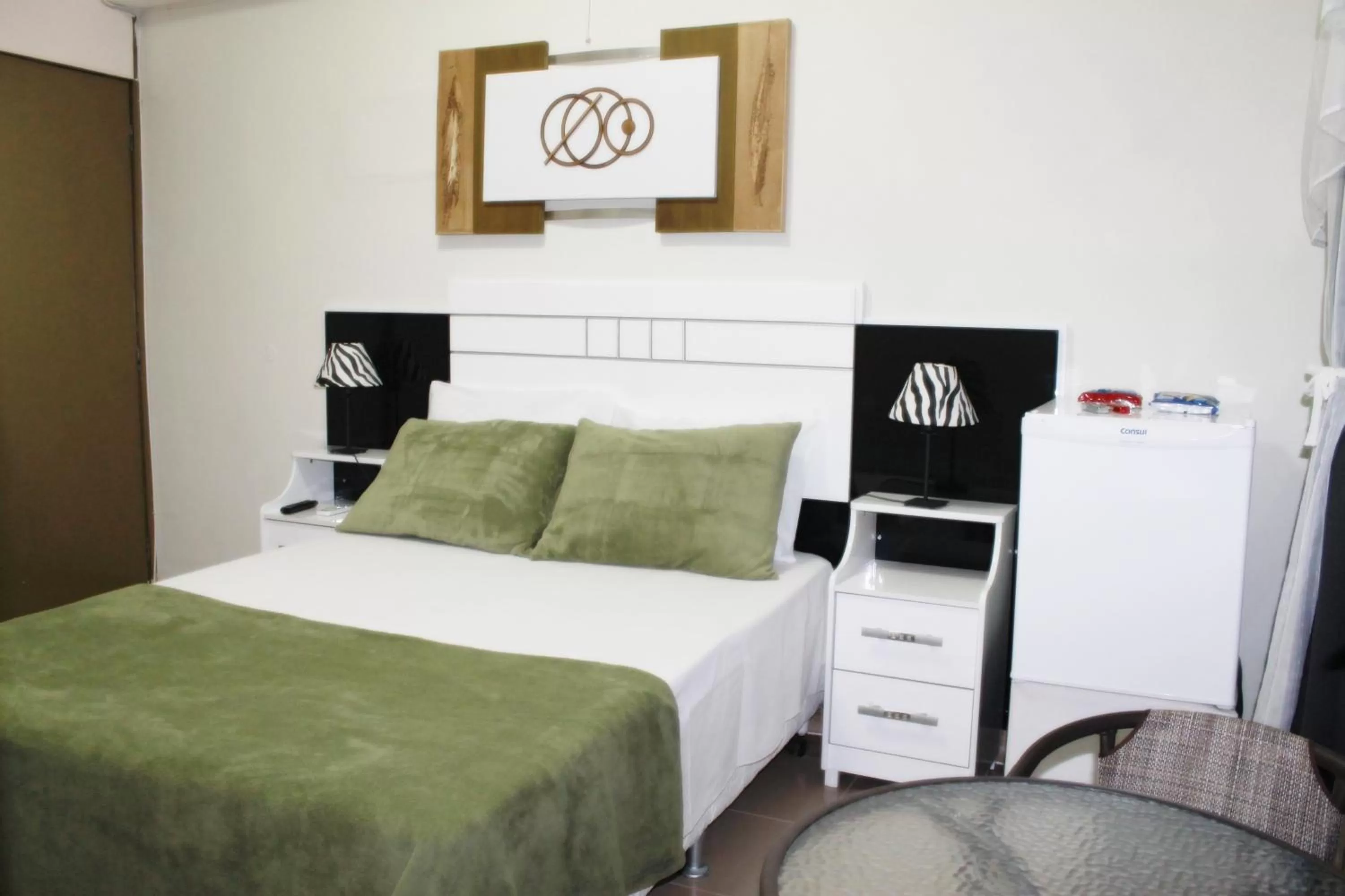 Bed in Pousada Das Palmeiras