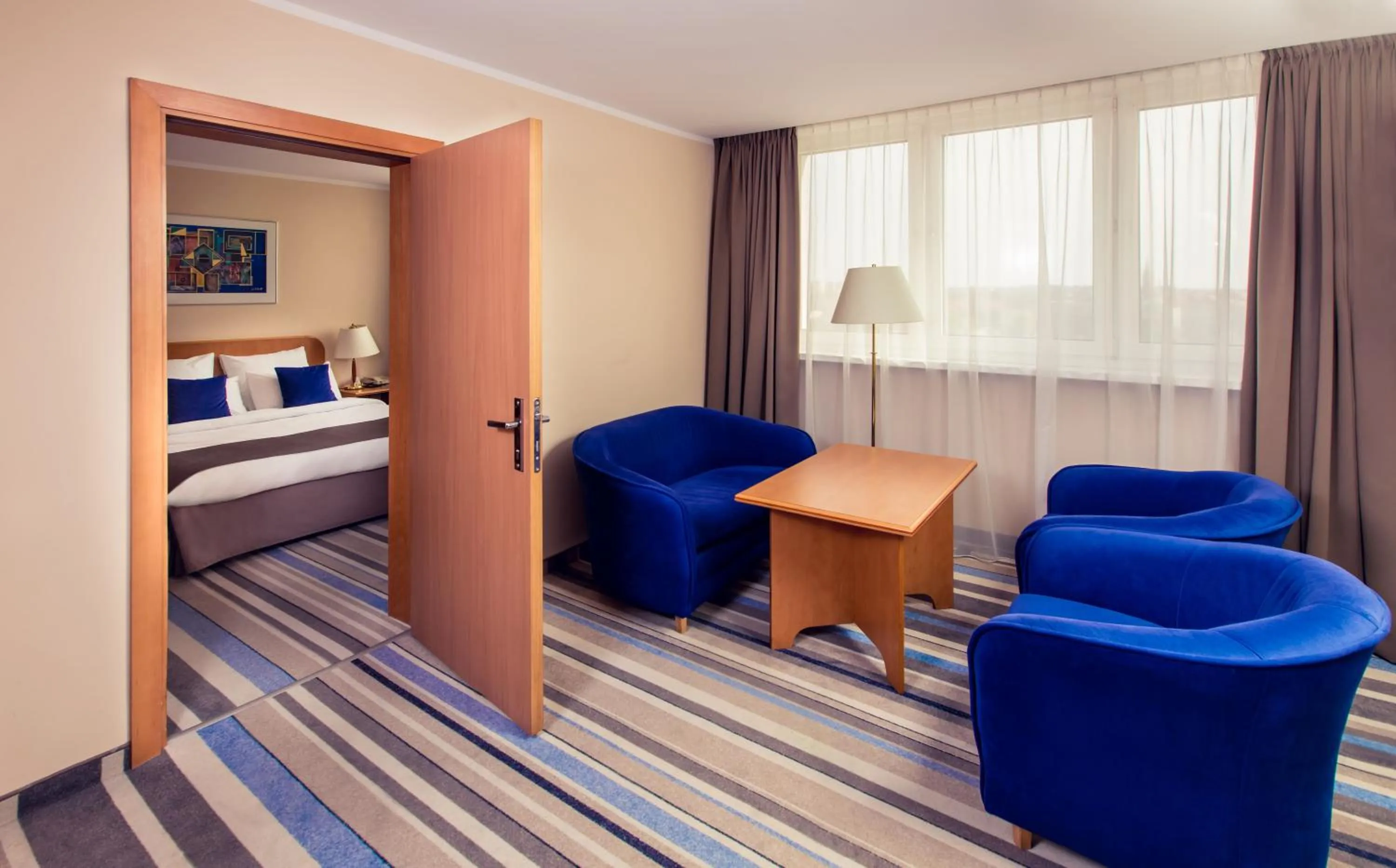 Living room, Bed in Hotel Mercure Toruń Centrum