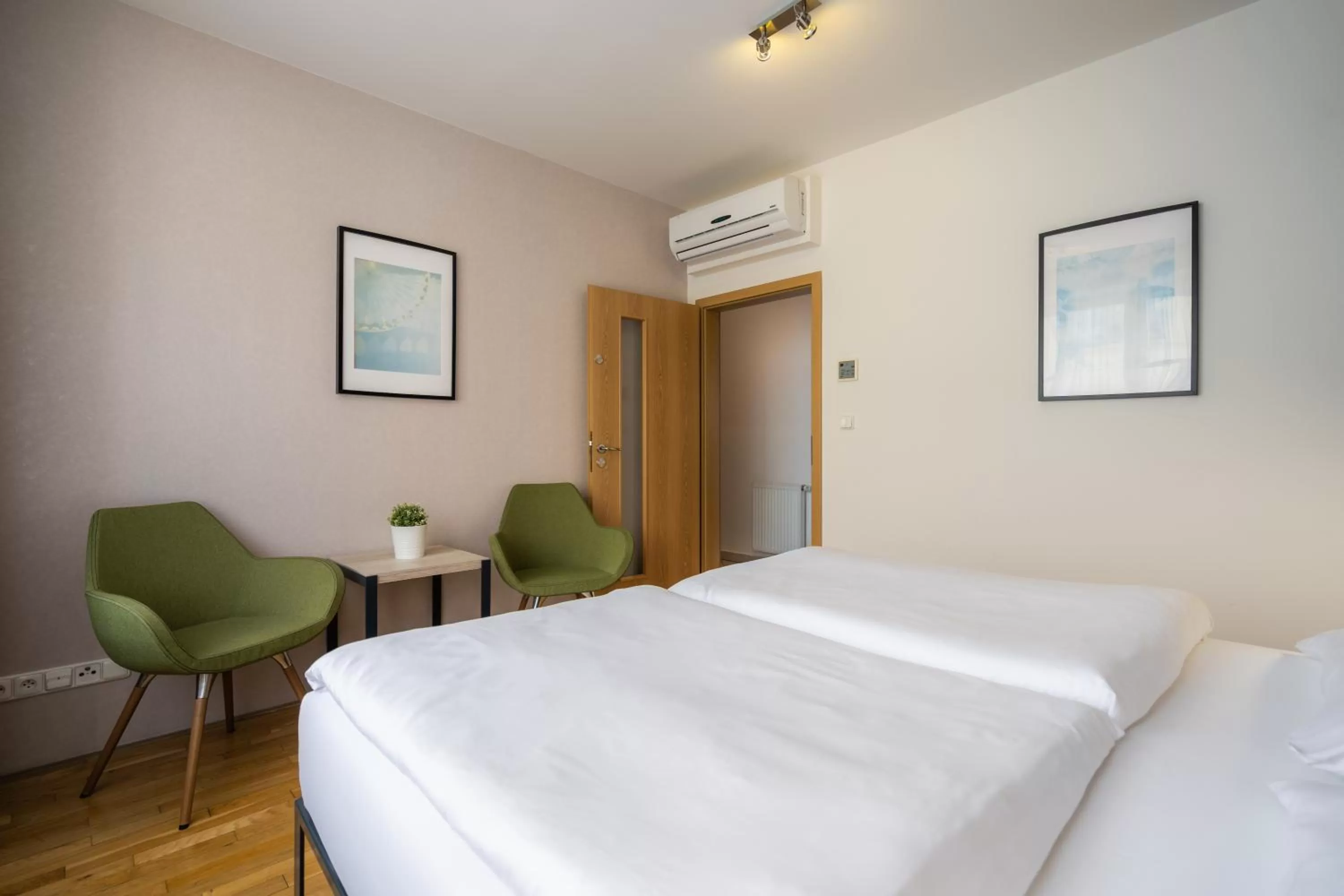 Bed in EA ApartHotel Melantrich