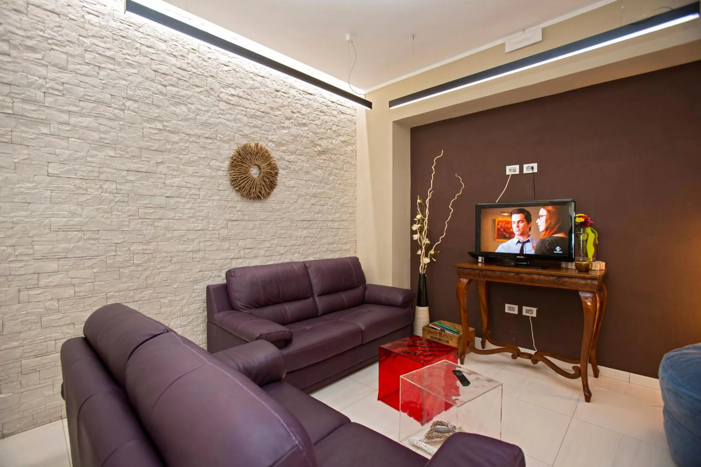 Communal lounge/ TV room in Hotel lo Squalo
