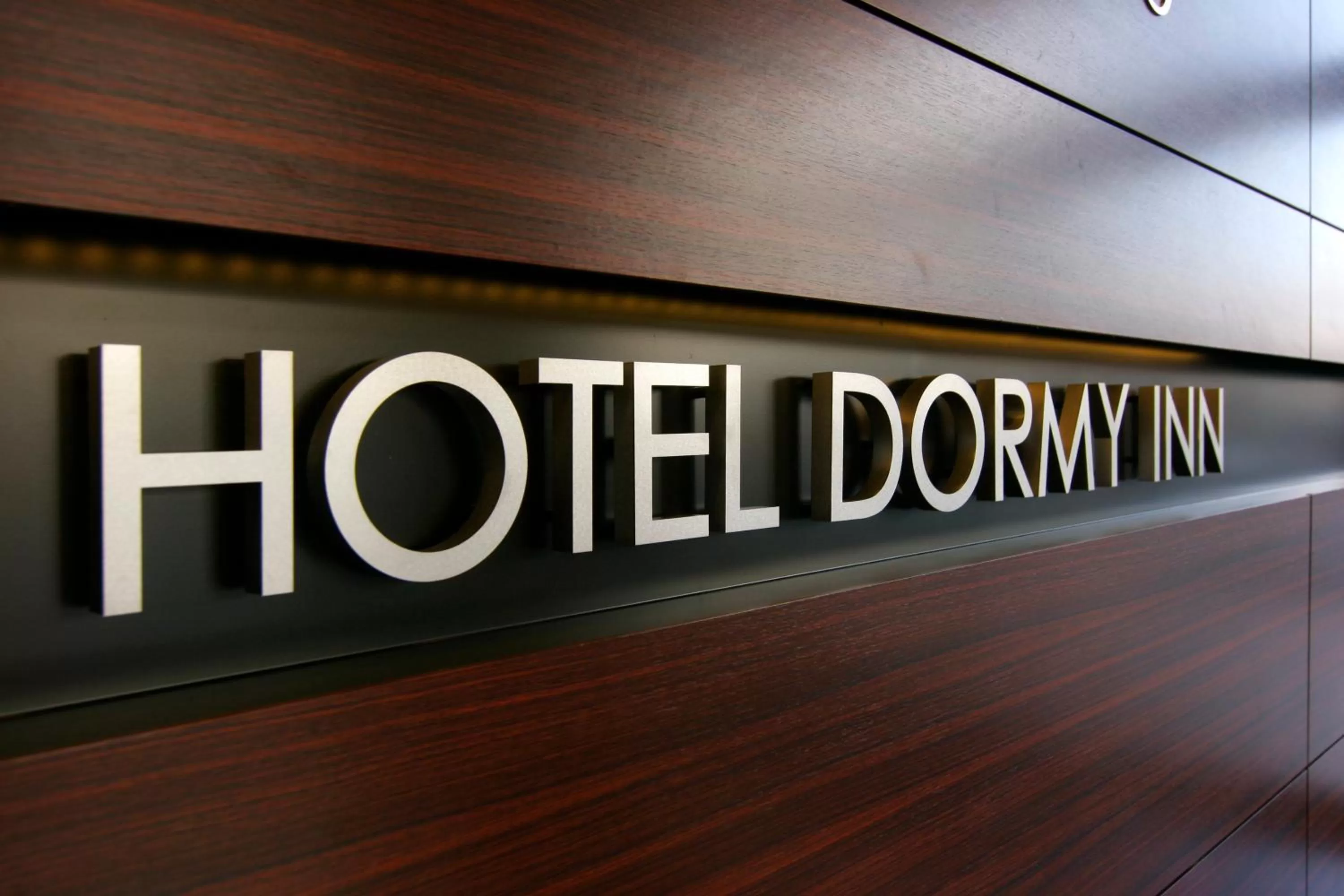 Property logo or sign in Dormy Inn Kumamoto Natural Hot Spring