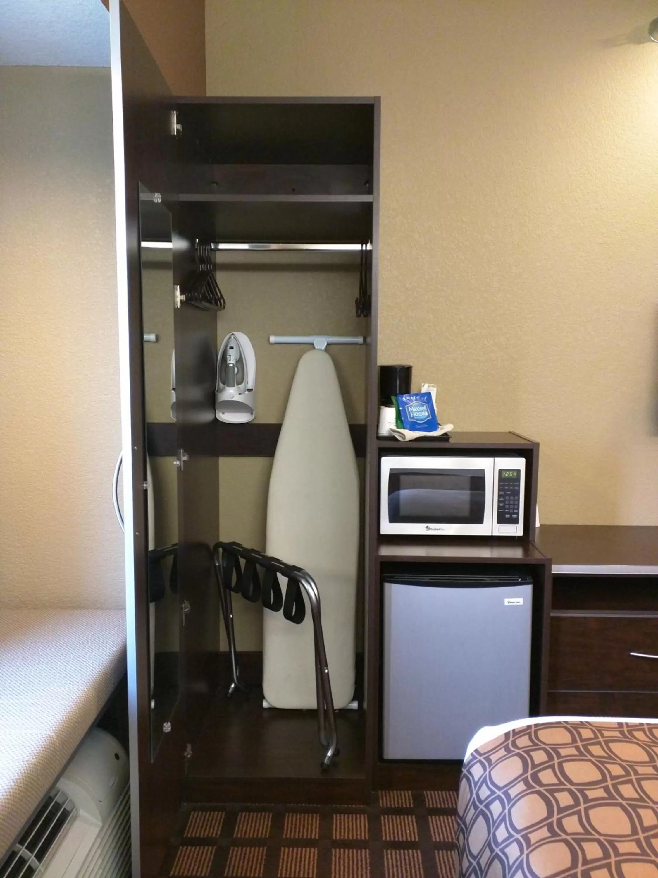 Decorative detail, Bed in Microtel Inn & Suites by Wyndham Minot