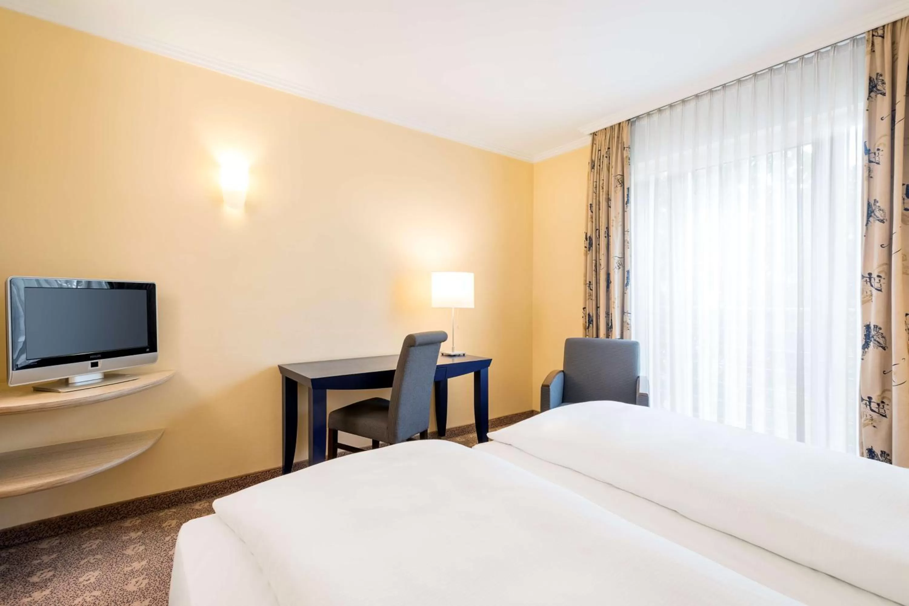 Photo of the whole room, Bed in NH Potsdam