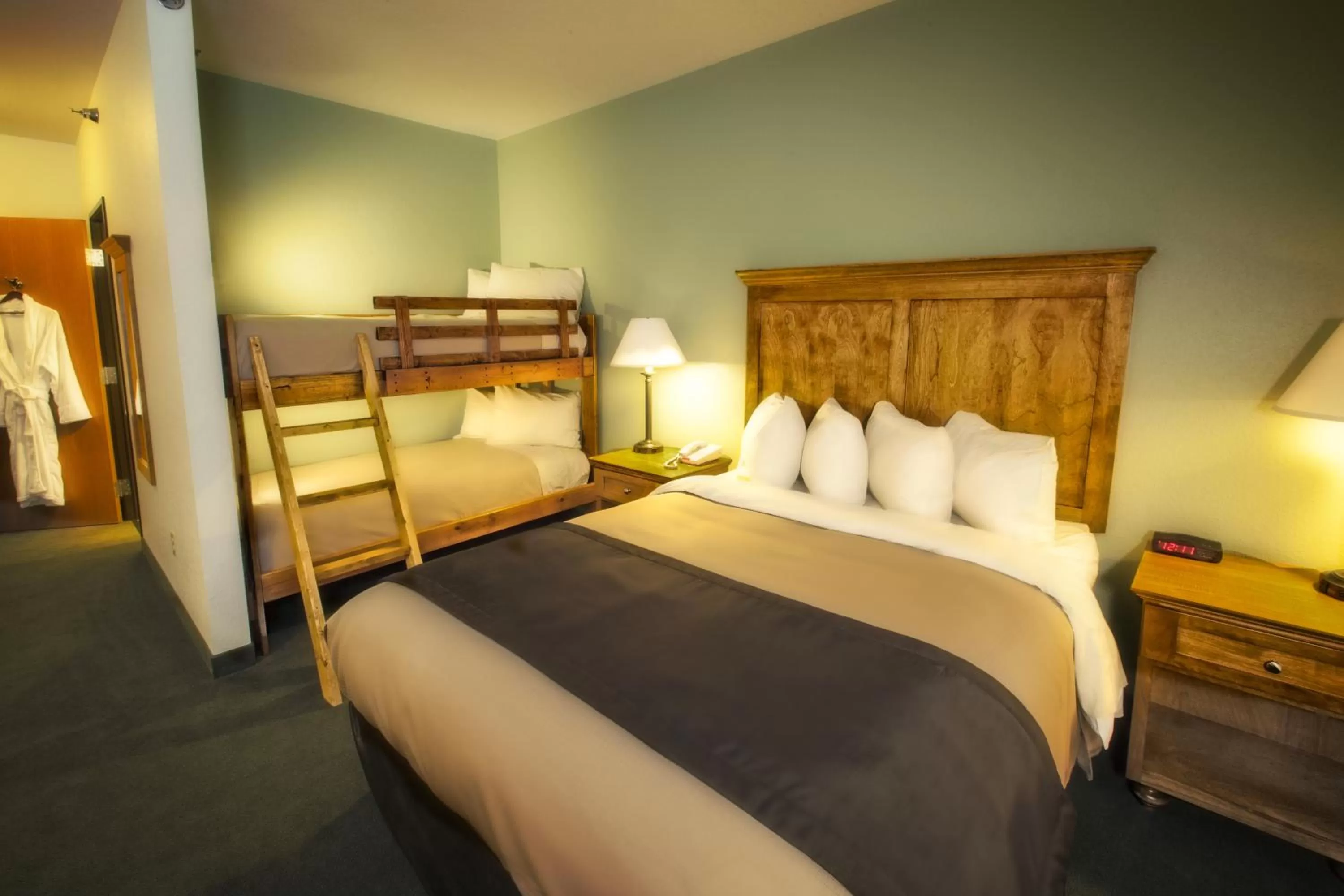 Bed in Junction Inn Suites & Conference Center