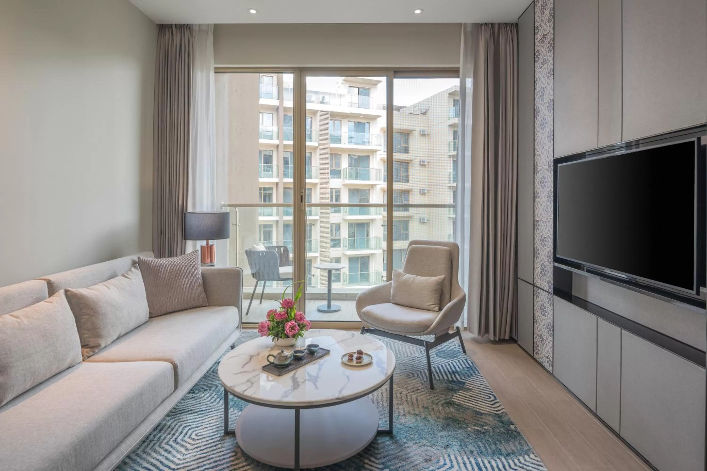 Communal lounge/ TV room in Oakwood Premier Phnom Penh