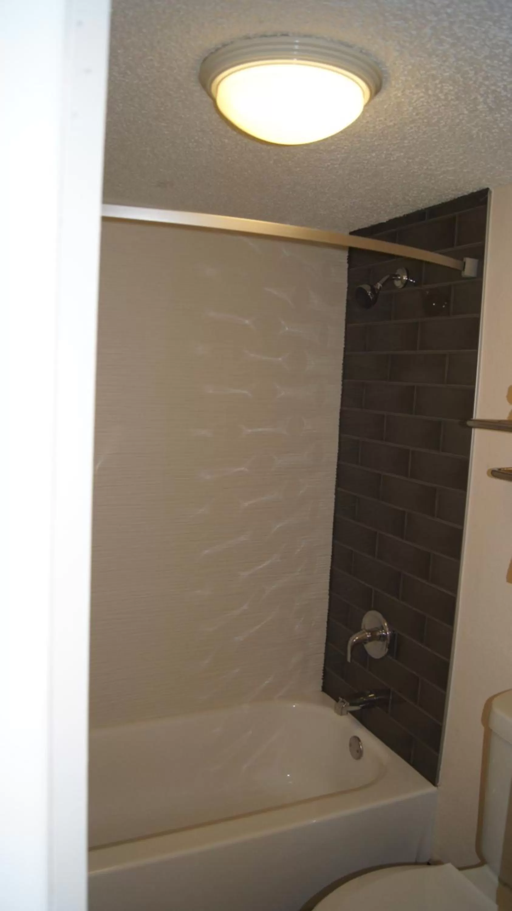 Shower in Travelodge by Wyndham North Richland Hills/Dallas/Ft Worth