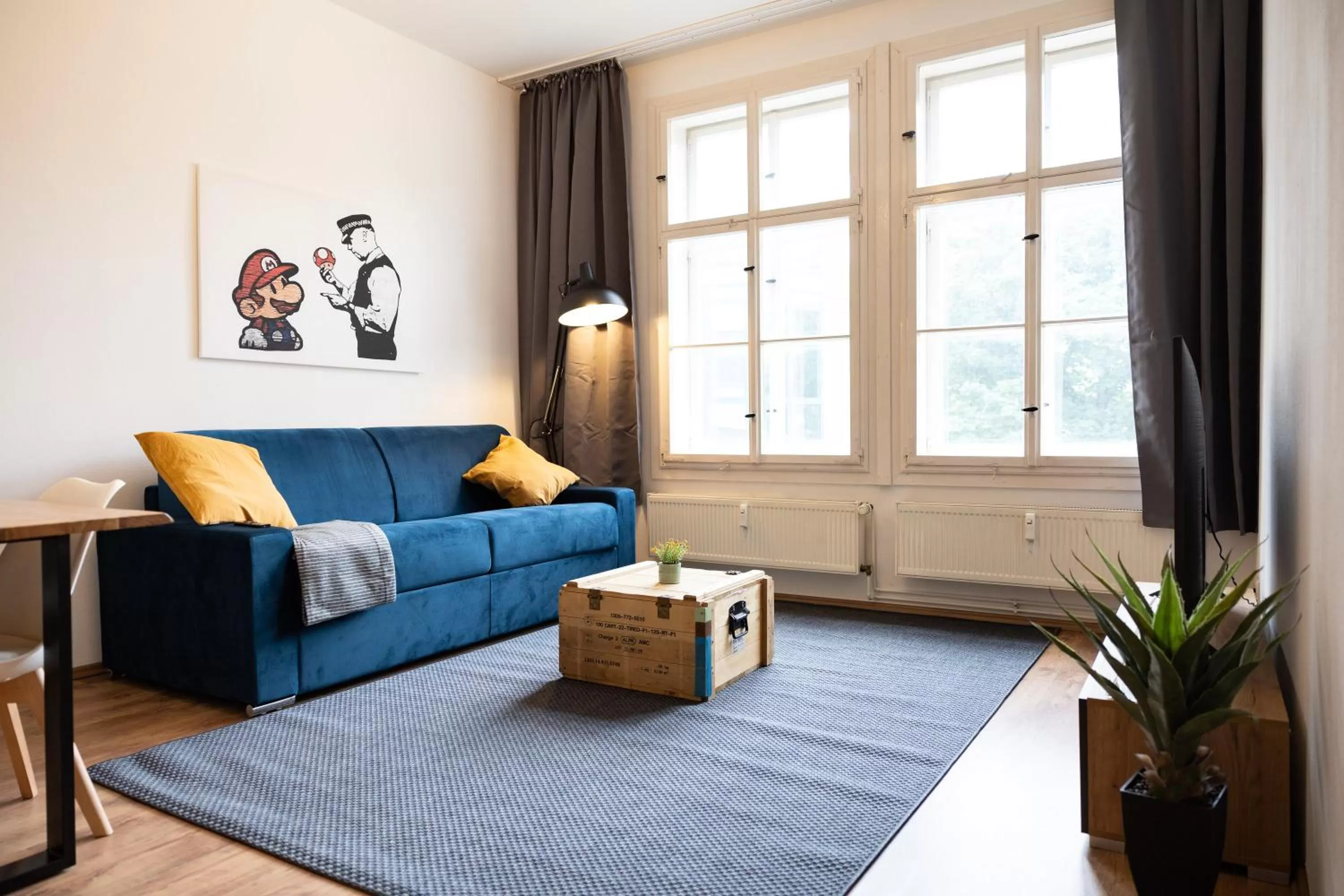 Living room, Seating Area in Ko-Living Space an der Oper - Street Art Design Apartments