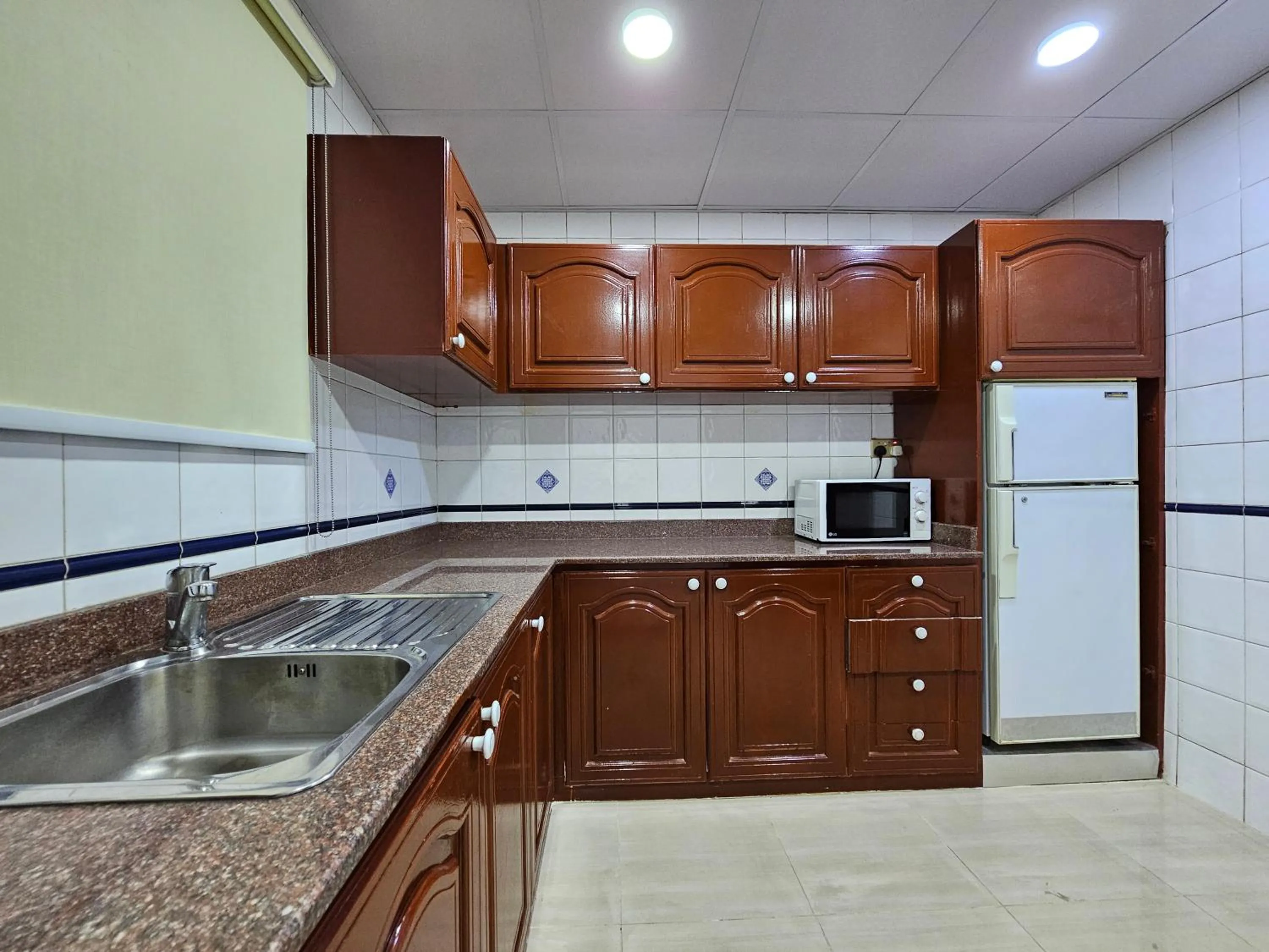 Kitchen or kitchenette in Majestic Hotel