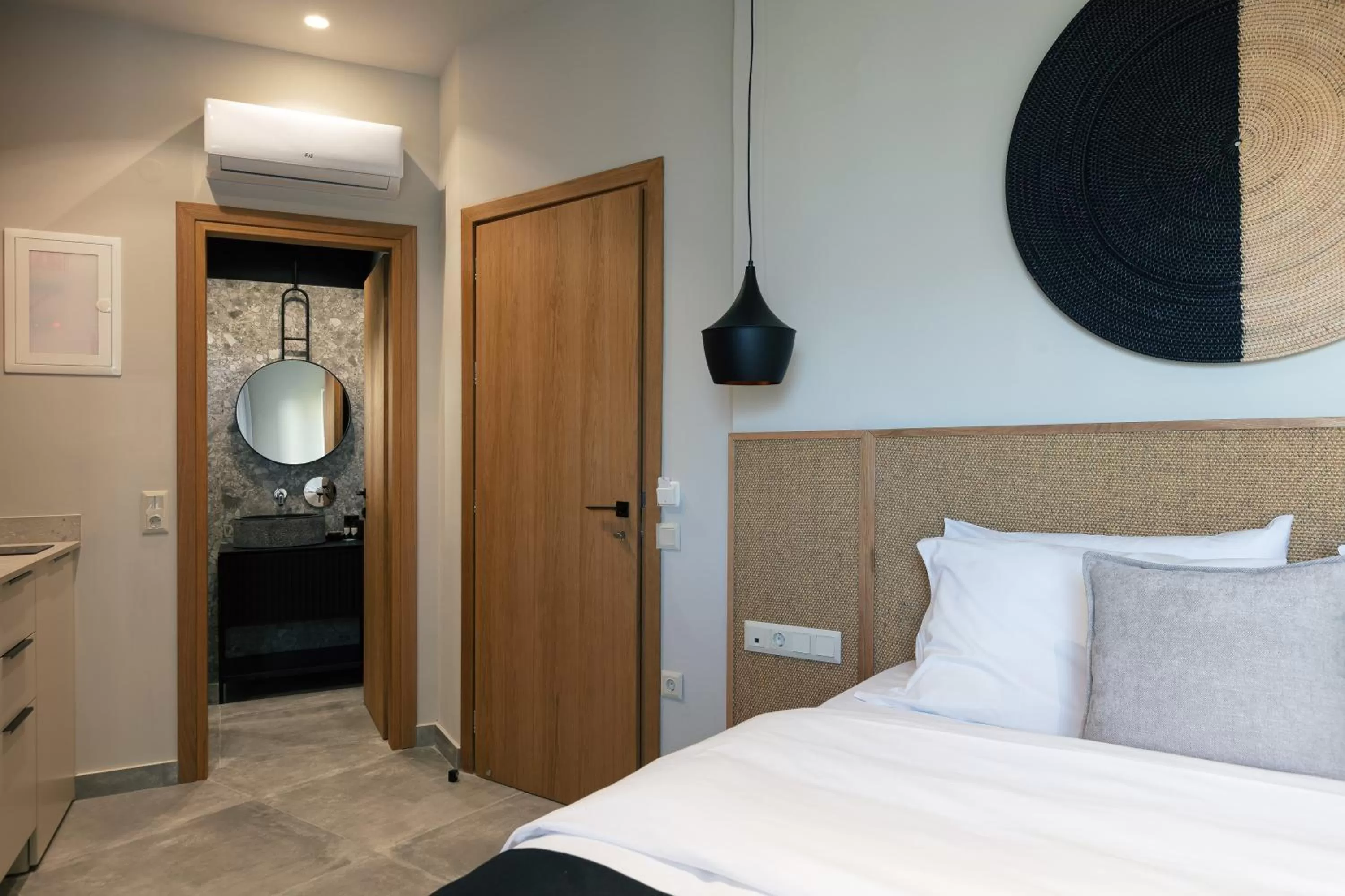 Photo of the whole room, Bed in Chapter 02 Gallery Suites