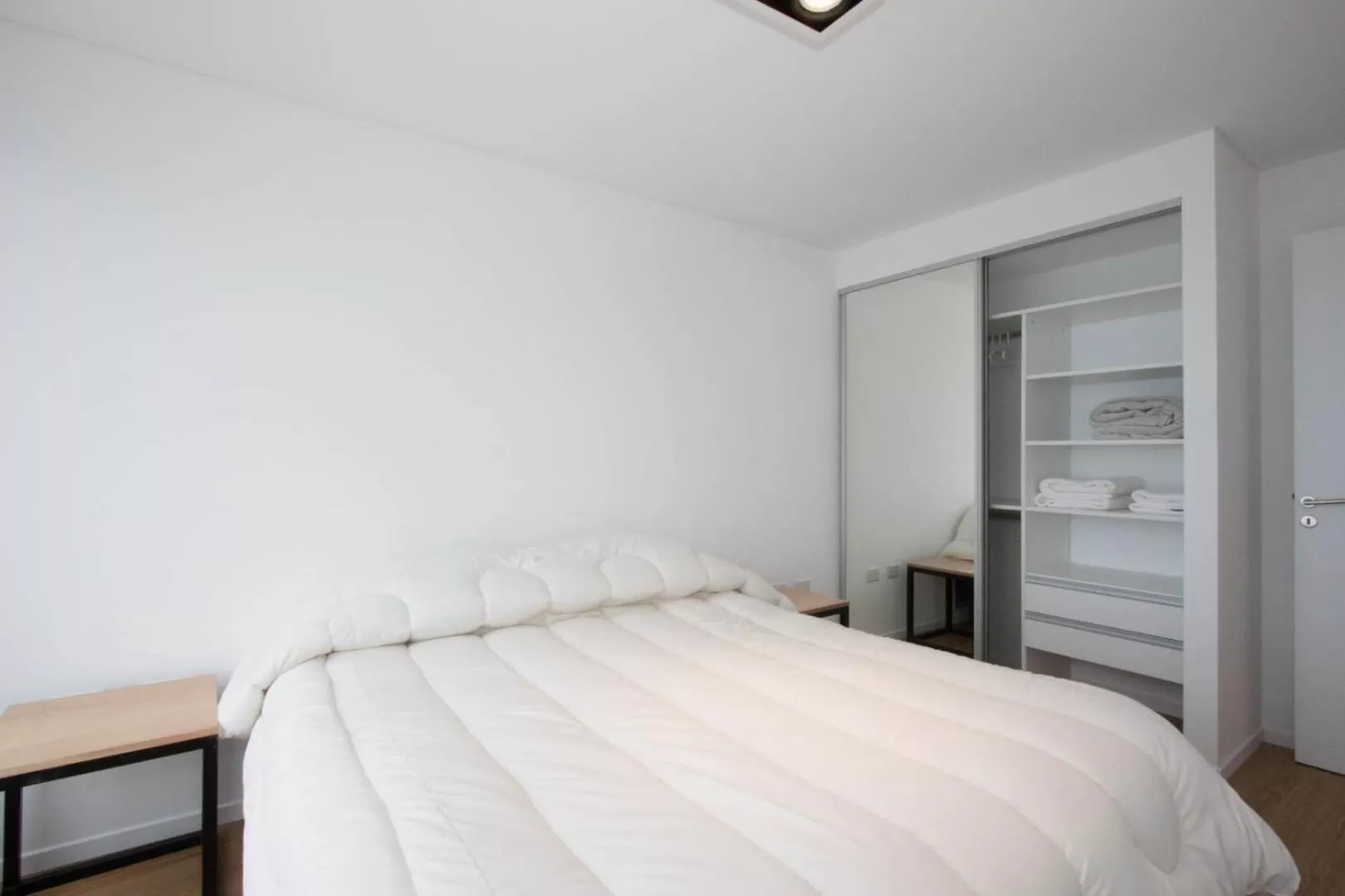 Bed in De la Costa Apartamentos