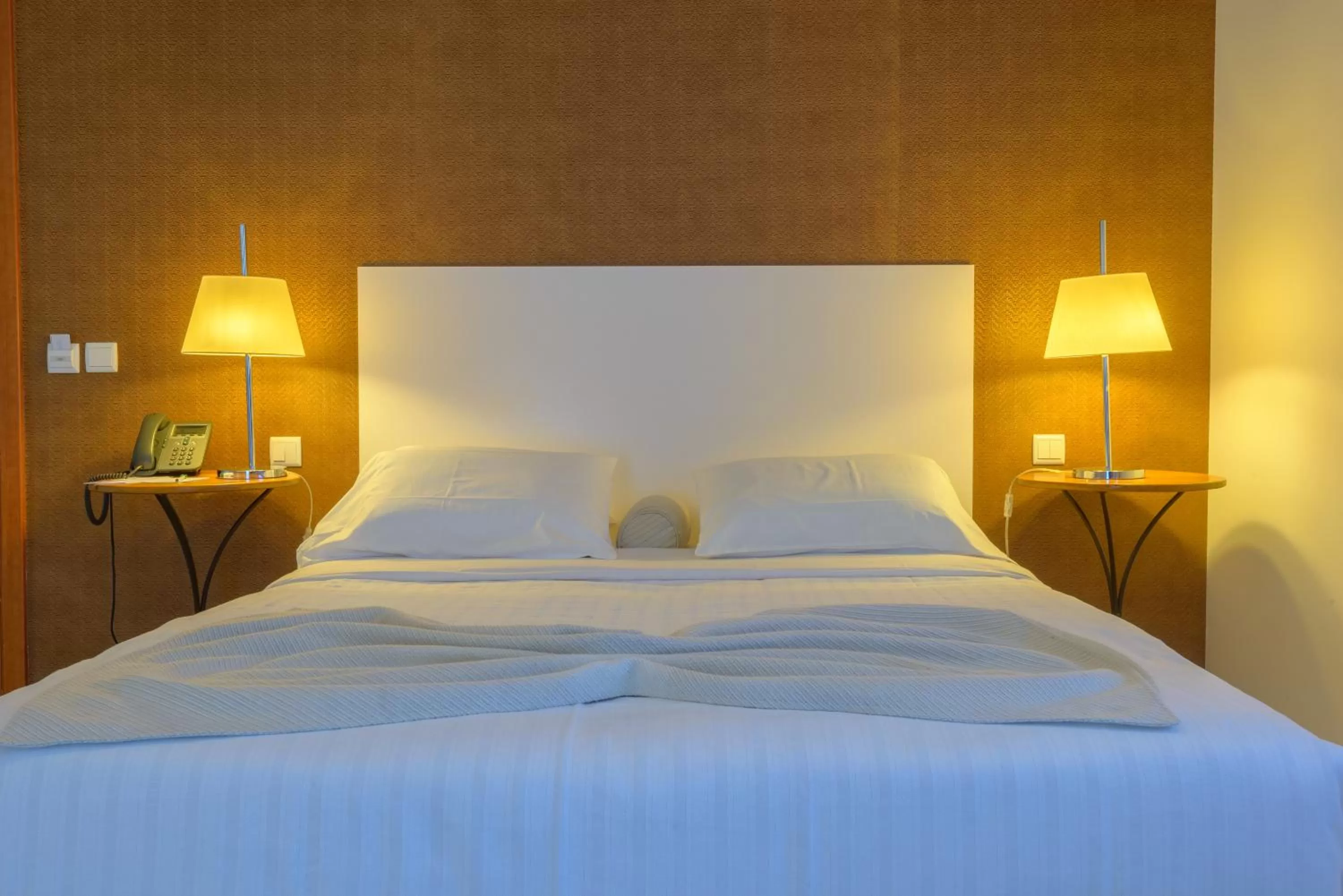 Bed in Amazonia Estoril Hotel