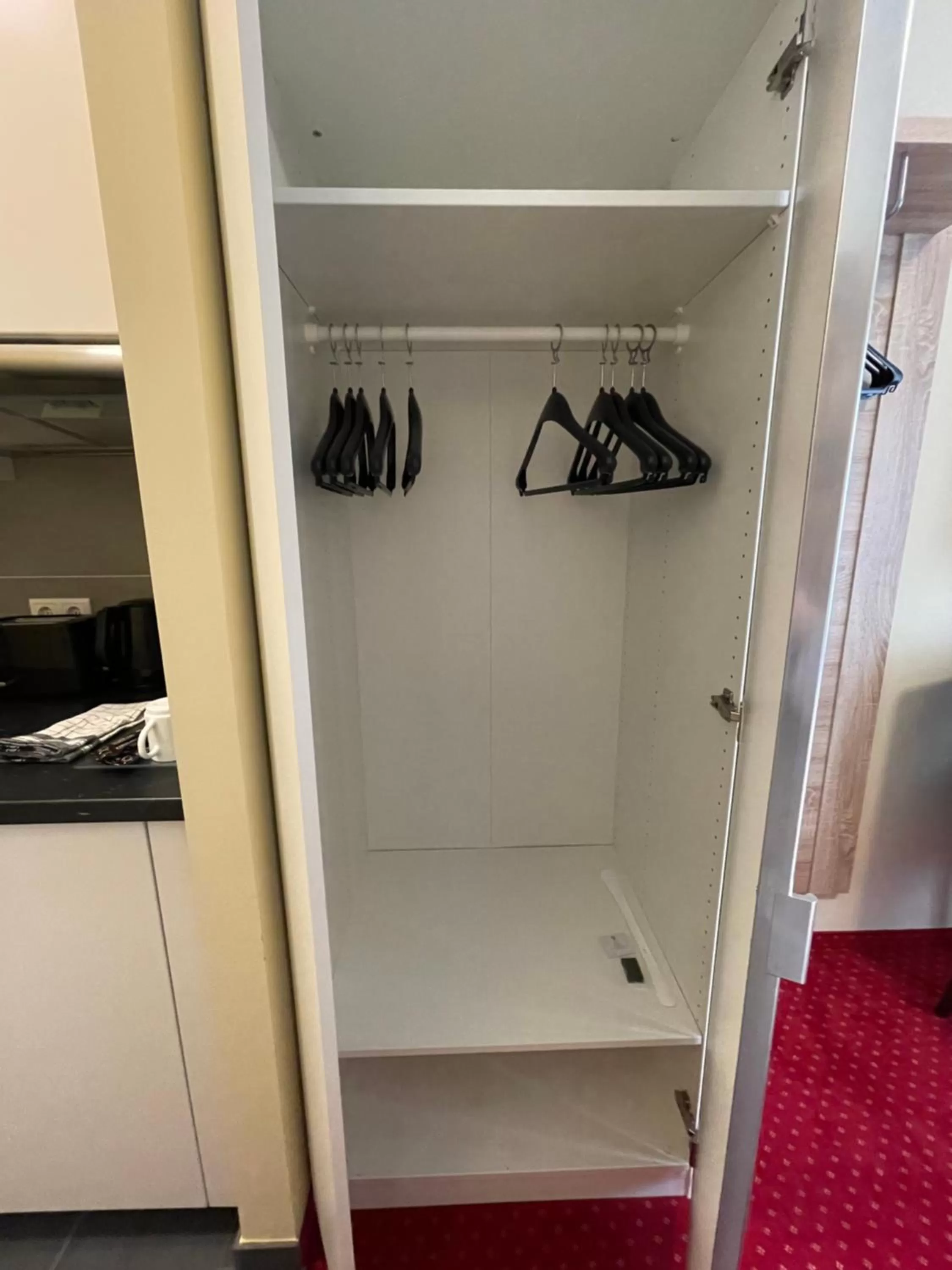 wardrobe in Palm Premium Hotel & Apartments