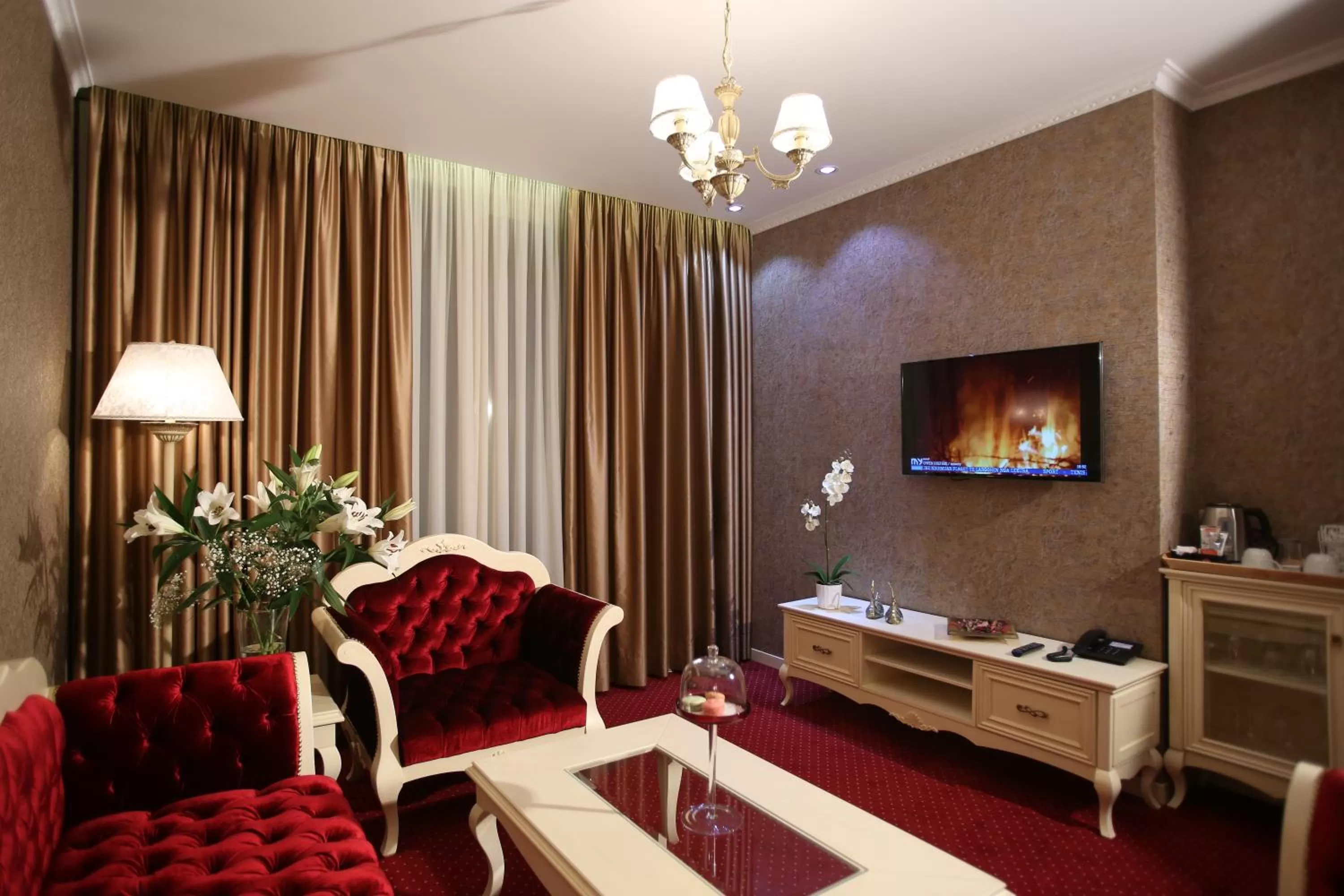 Communal lounge/ TV room in Grand Hotel & Spa Tirana