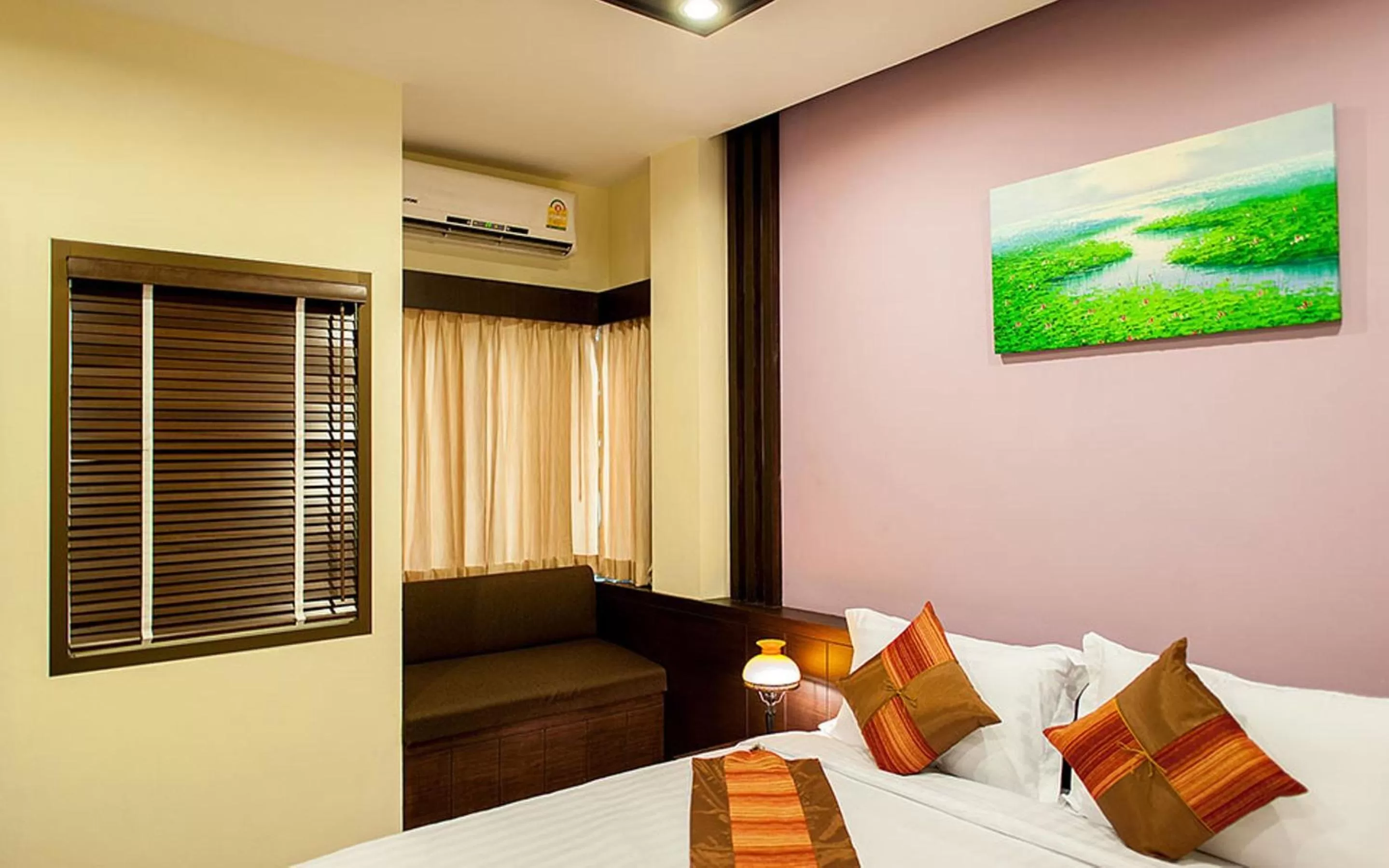 Decorative detail, Bed in Tara Place Hotel Bangkok