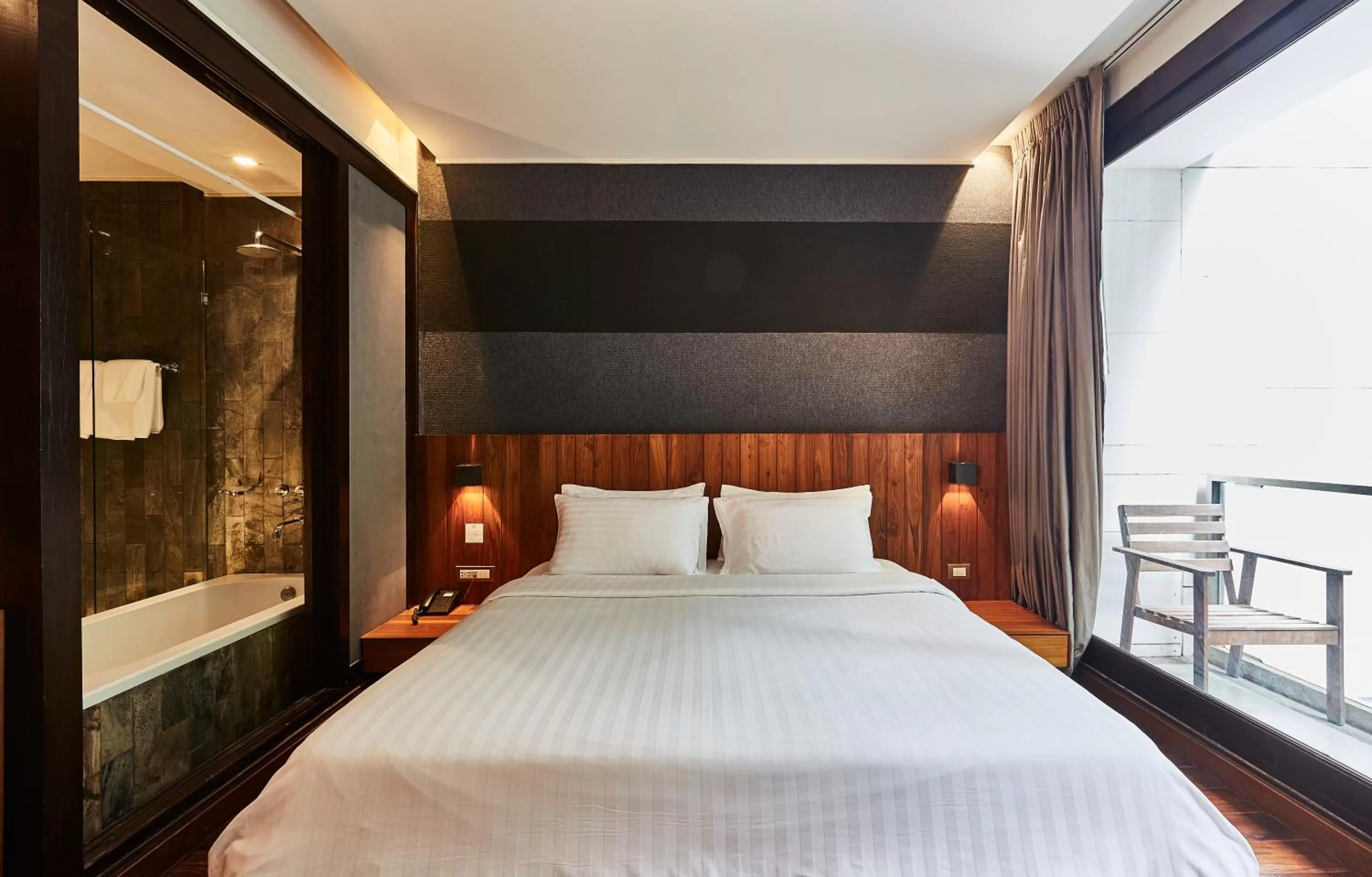 Bed in LUXX Langsuan Hotel - SHA Plus