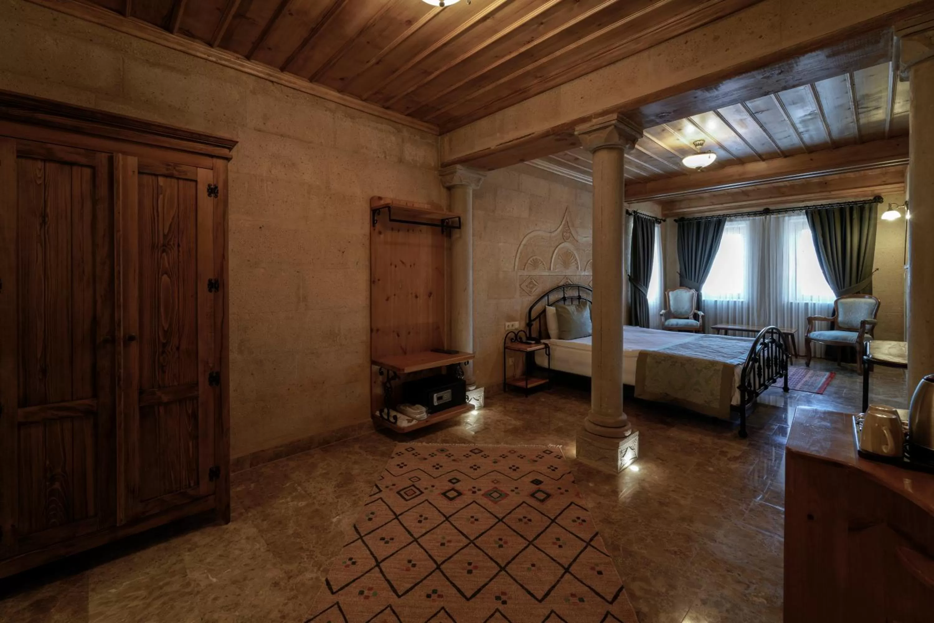 Photo of the whole room, Bed in Cratus Stone Palace