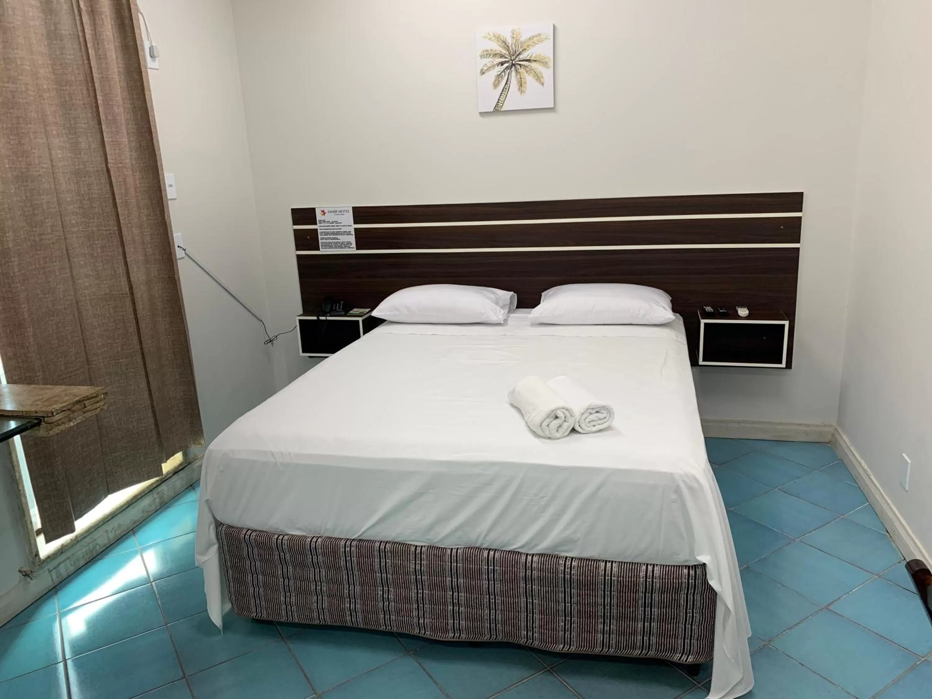 Bed in SAMIR HOTEL COMFORT