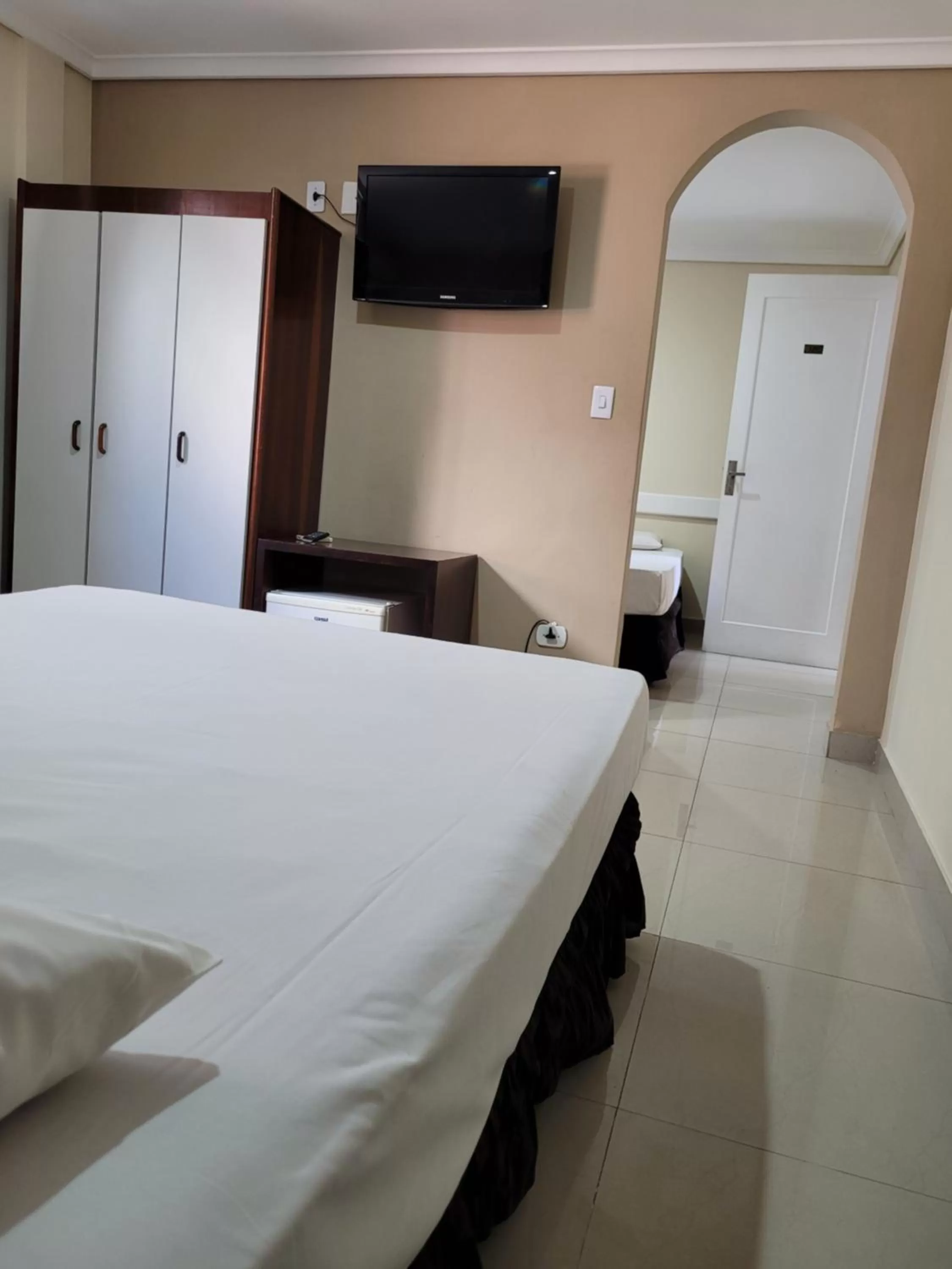 Bed in Hotel Estação Express