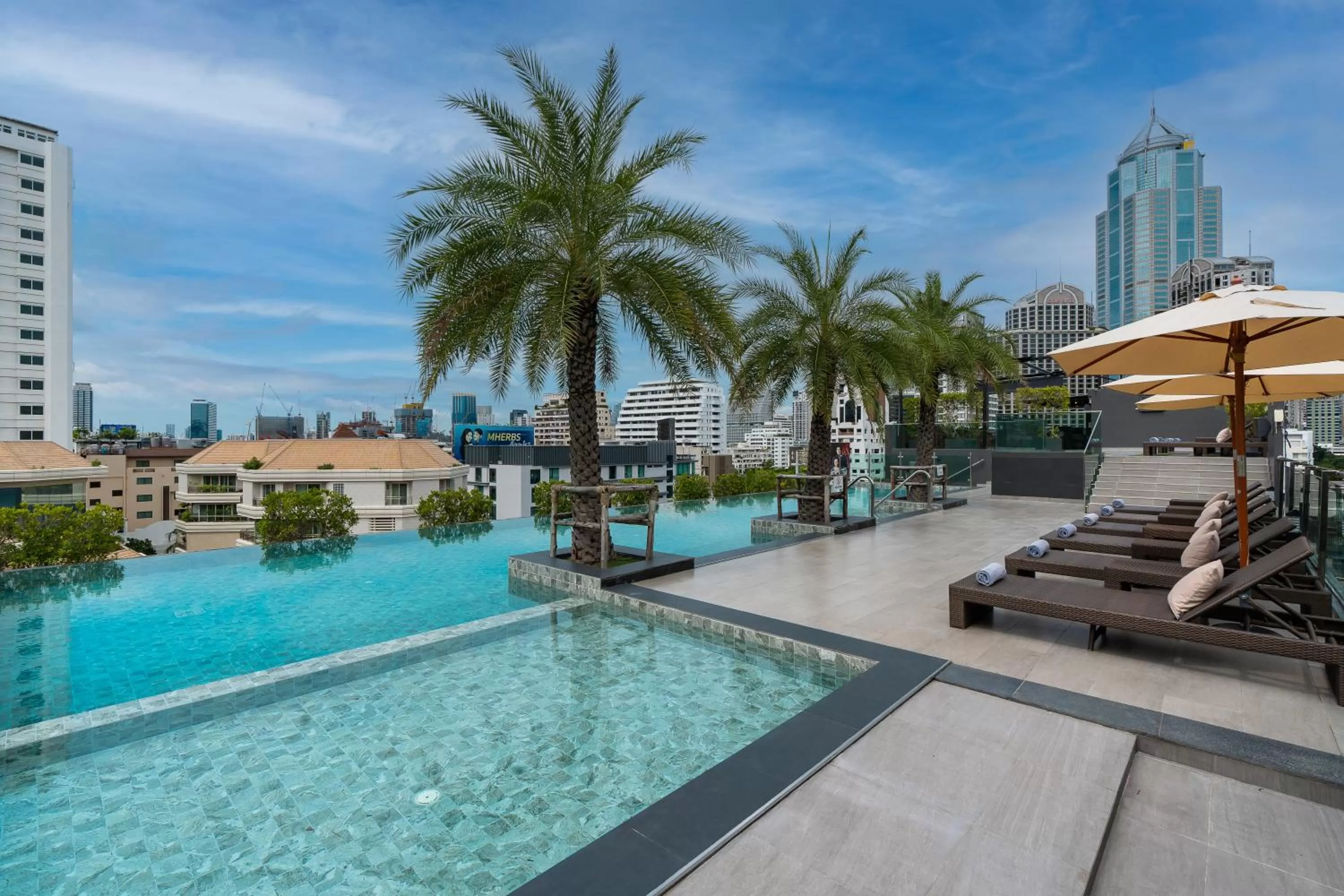 Swimming pool in SureStay Plus by Best Western Sukhumvit 2